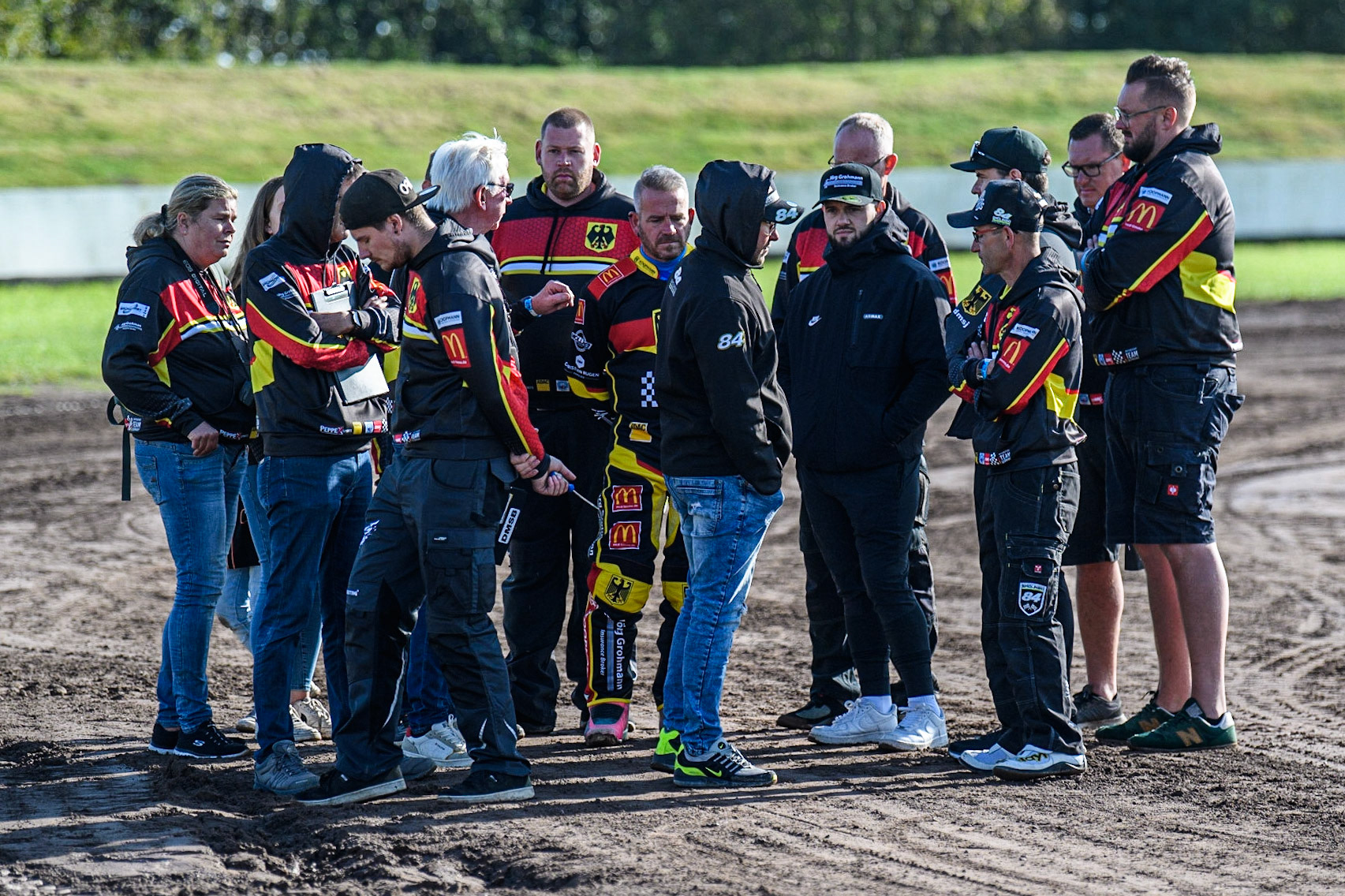 The German team on track meeting after their track walk during the FIM Long Track Of Nations event at the Speed Centre Roden on Sunday 24th September 2023. (Photo: Ian Charles | MI News)
