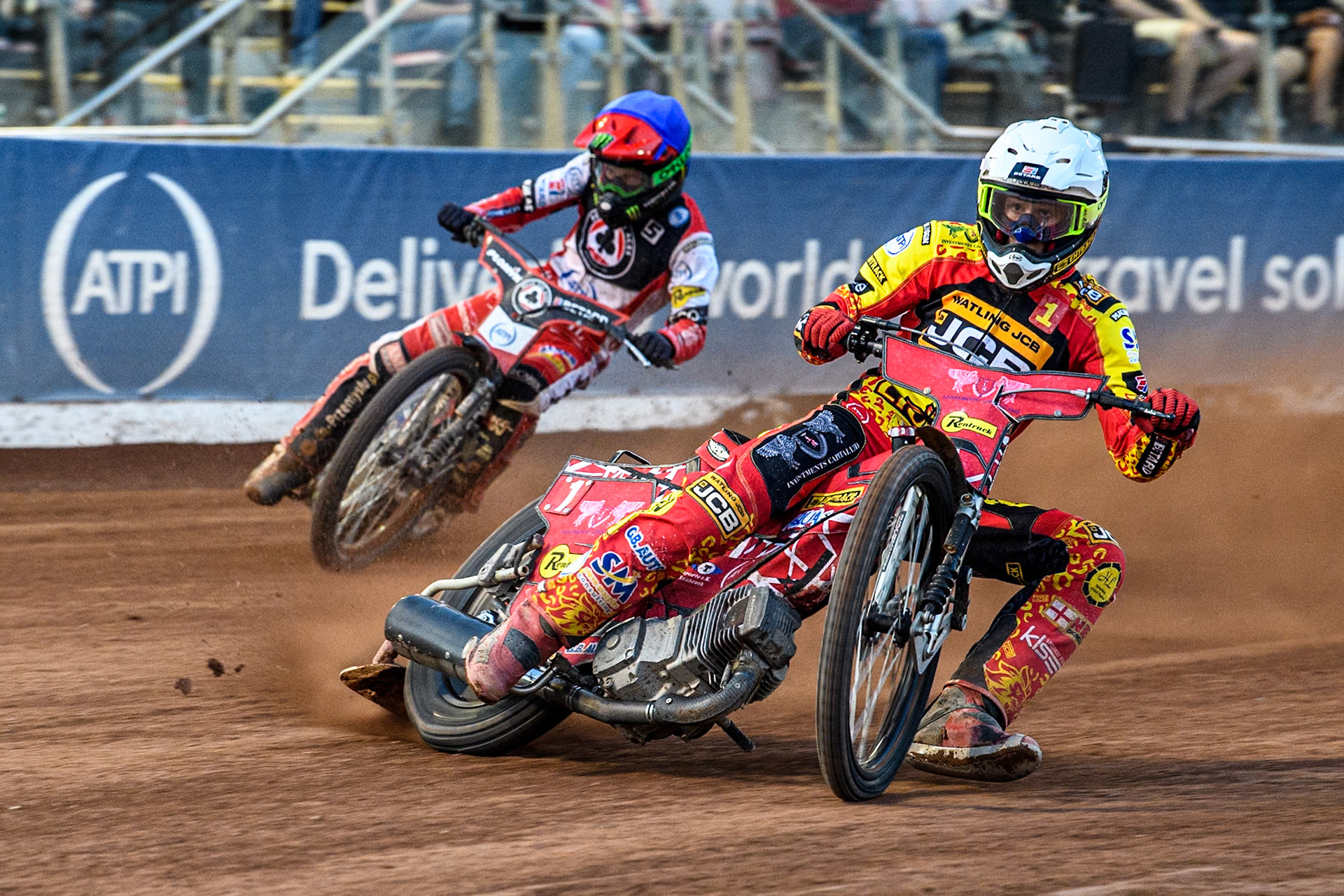 Leicester Lions' Max Fricke in White leading Belle Vue Aces' Dan Bewley in Blue during the Rowe Motor Oil Premiership match between Belle Vue Aces and Leicester Lions at the National Speedway Stadium, Manchester on Monday 24th June 2024. (Photo: Ian Charles | MI News)