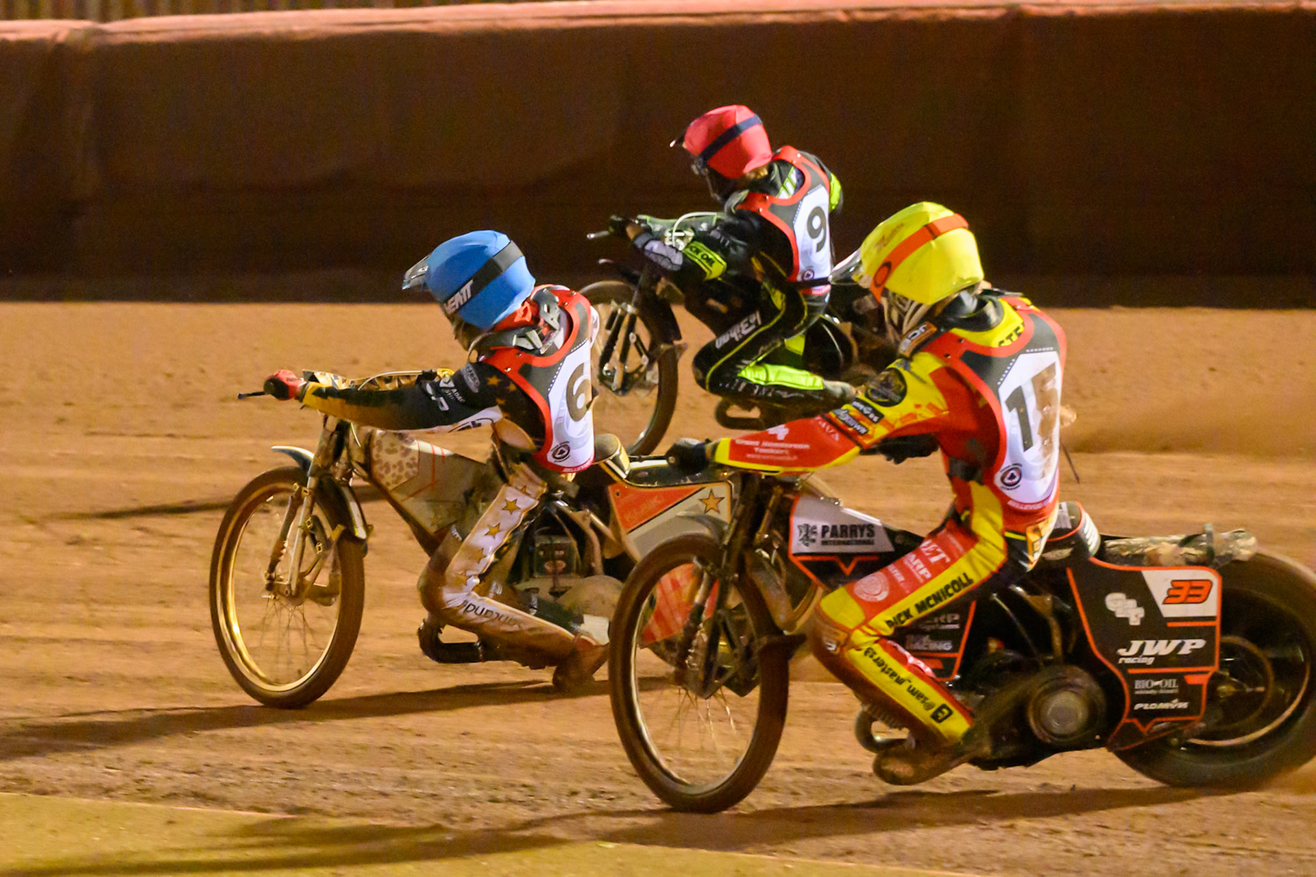 Sam Masters  in Yellow chases Norick Blodorn  in Blue and Adam Ellis  in Red during the Peter Craven Memorial Trophy at the National Speedway Stadium, Manchester, on Monday 16th March 2026. (Photo: Ian Charles | MI News)