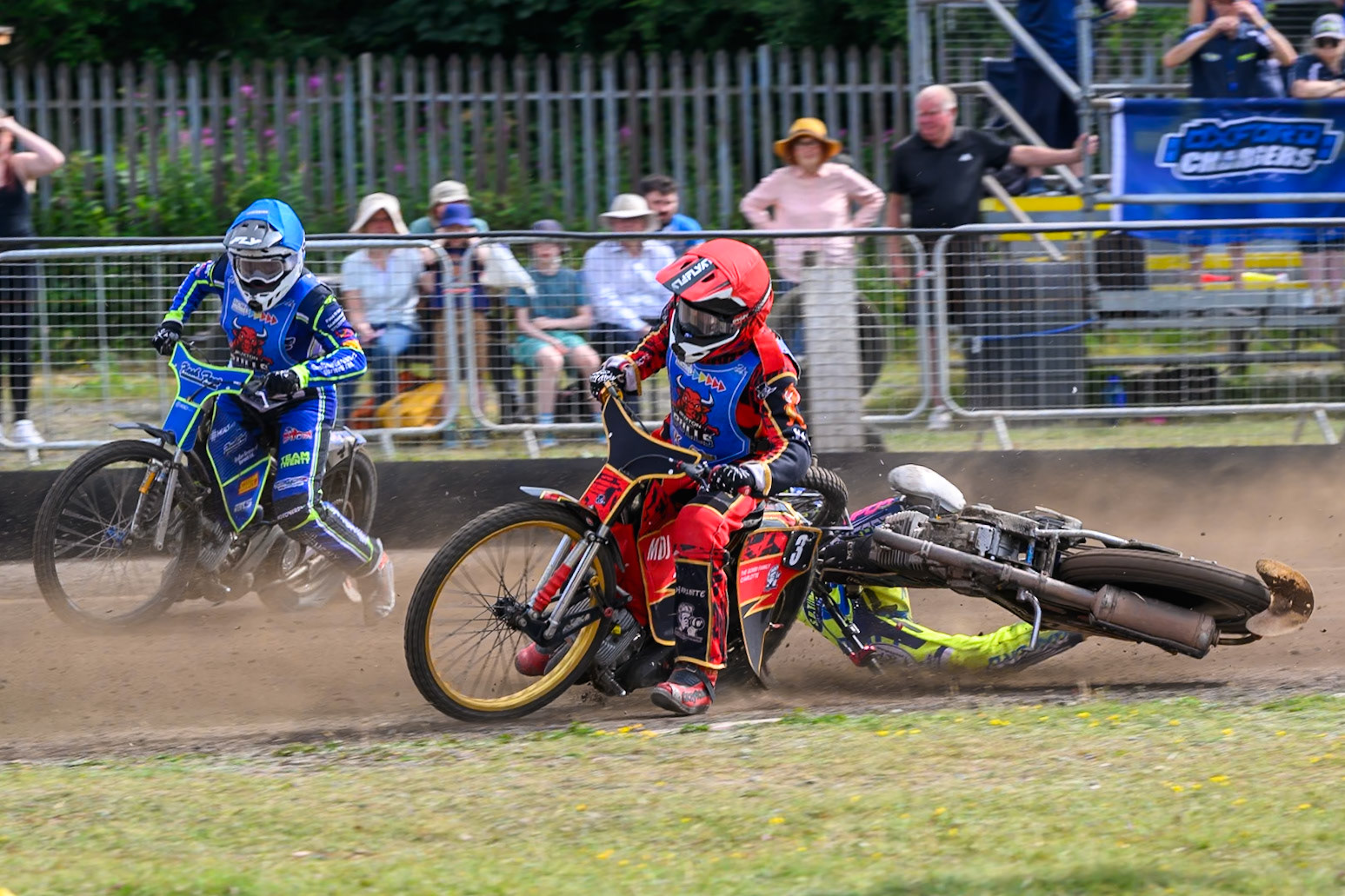 In the re-run of Heat 5, Darryl Ritchings of Oxford Chargers  falls behind Luke Harris of Buxton Bulls in Red  during the WSRA National Development League match between Buxton Bulls and Oxford Chargers at Hi-Edge Speedway, Buxton on Sunday 2nd August 2026. (Photo: Ian Charles | MI News)