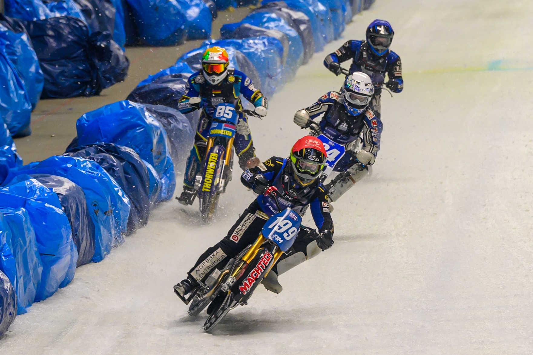 Sunday's Final: Martin Haarahiltunen (199) of Sweden in Red leading Max Koivula (24) of Finland in White, Luca Bauer (85) of Italy/Germany in Yellow and Niclas Svensson (192) of Sweden  in Blue during the Ice Speedway Gladiators World Championship Final 2 at Max-Aicher-Arena, Inzell on Sunday 15th March 2026. (Photo: Ian Charles | MI News)
