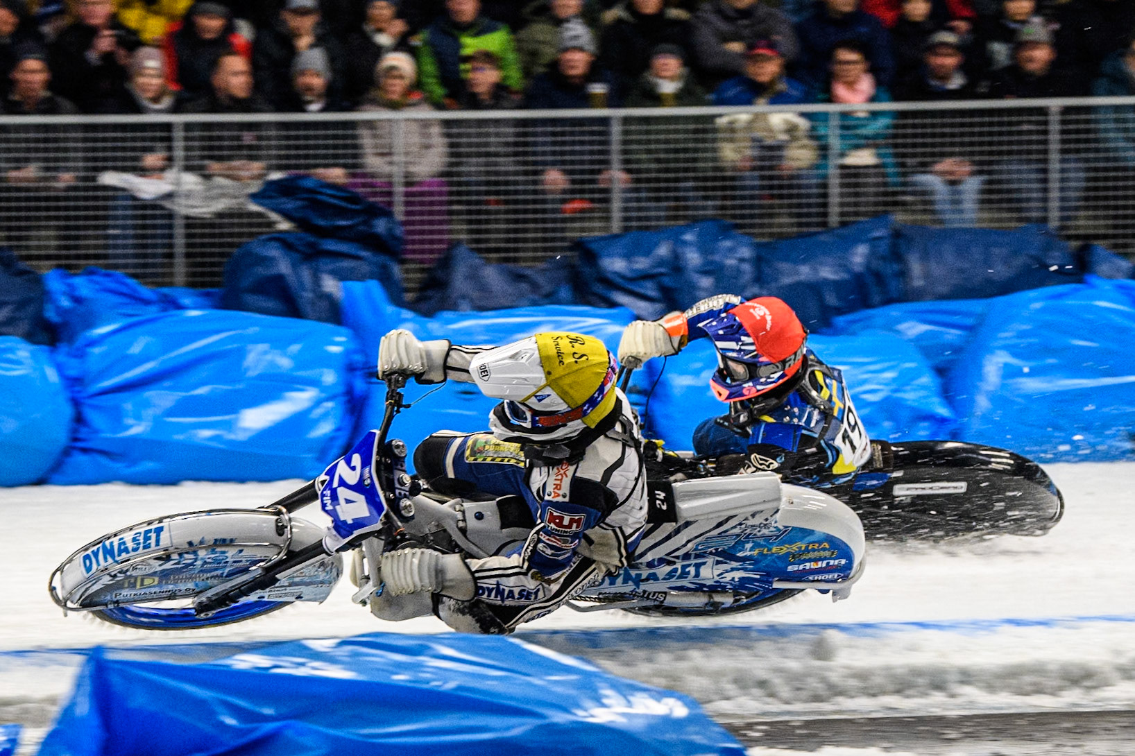 Max Koivula (24) of Finland in Yellow rides inside Niclas Svensson (192) of Sweden in Red during the Ice Speedway Gladiators World Championship Final 2 at Max-Aicher-Arena, Inzell on Sunday 16th March 2025. (Photo: Ian Charles | MI News)
