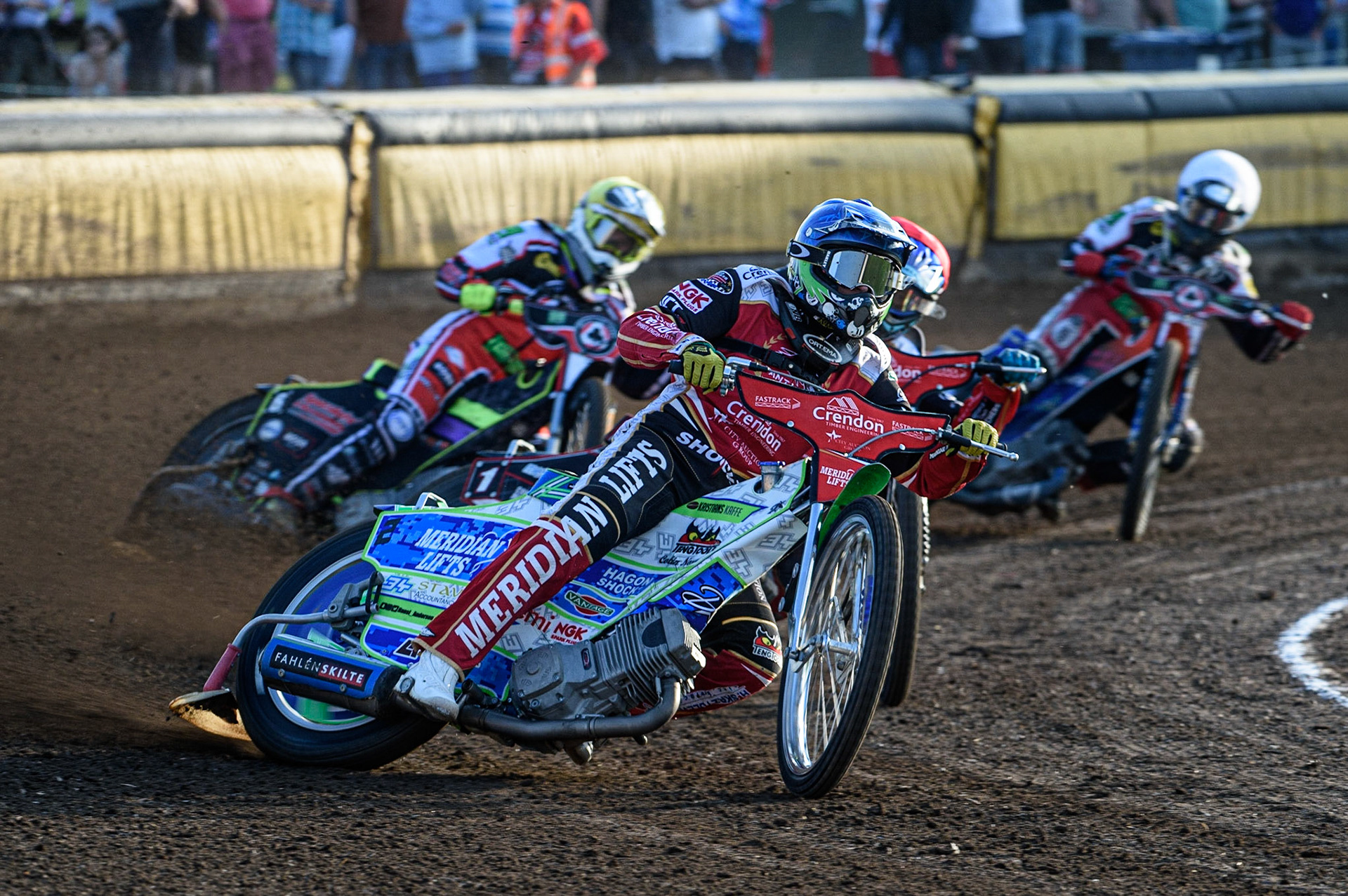 PETERBOROUGH, UK. JULY 19TH  Peterborough Crendon Panthers take an early lead as Hans Andersen  (Blue) and Ulrich Ostergaard  (Red) lead Tom Brennan  (Yellow) and Brady Kurtz  (White) to take maximum heat points during the SGB Premiership match between Peterborough and Belle Vue Aces at East of England Showground, Peterborough on Monday 19th July 2021. (Credit: Ian Charles | MI News)