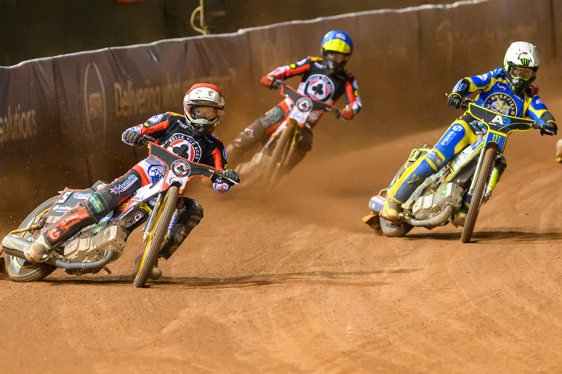 Jason Doyle of Belle Vue Aces in Red l\Chris Holder of Sheffield Tigers in White  and Tate Zischke of Belle Vue Aces in Blue during the Rowe Motor Oil Premiership match between Belle Vue Aces and Sheffield Tigers at the National Speedway Stadium, Manchester on Monday 14th September 2026. (Photo: Ian Charles | MI News)