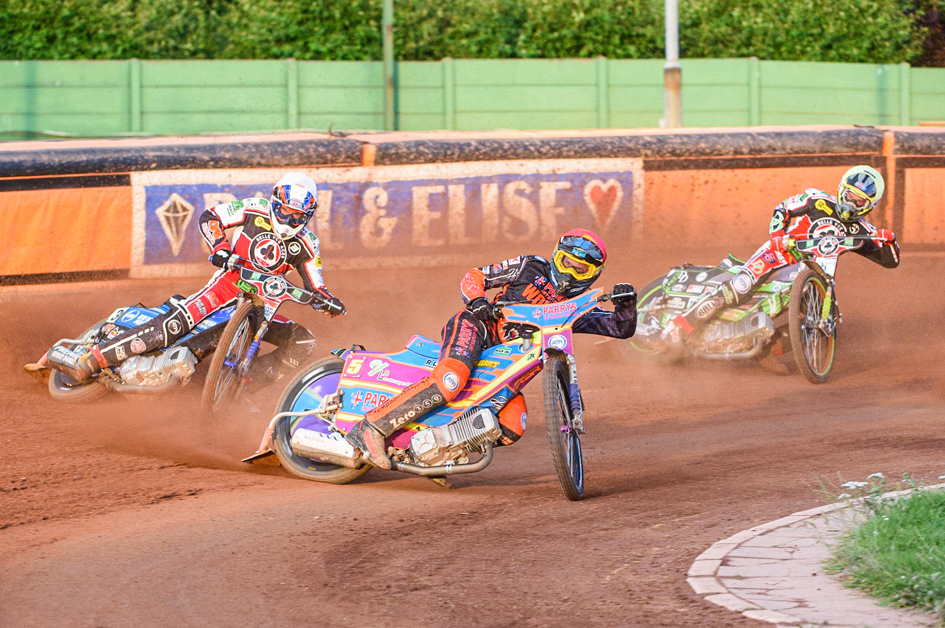 WOLVERHAMPTON, UK. JULY 26TH  Rory Schlein  (Red) leads Steve Worrall  (White) and Charles Wright  (Yellow) during the SGB Premiership match between Wolverhampton Wolves and Belle Vue Aces at the Ladbroke Stadium, Wolverhampton on Monday 26th July 2021. (Credit: Ian Charles | MI News)