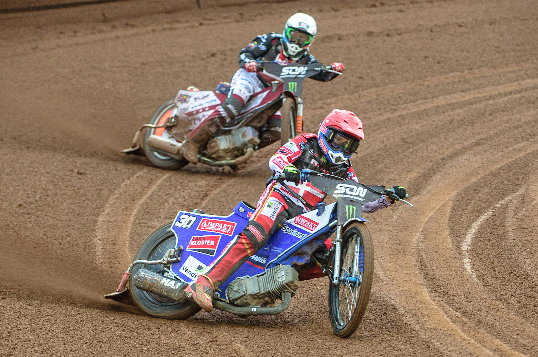 MANCHESTER, UK. OCT 17TH Leon Madsen of Denmark (Red) leads Andzejs Lebedevs of Latvia (White) during the Monster Energy FIM Speedway of Nations at the National Speedway Stadium, Manchester on Sunday  17th October 2021. (Credit: Ian Charles | MI News)
