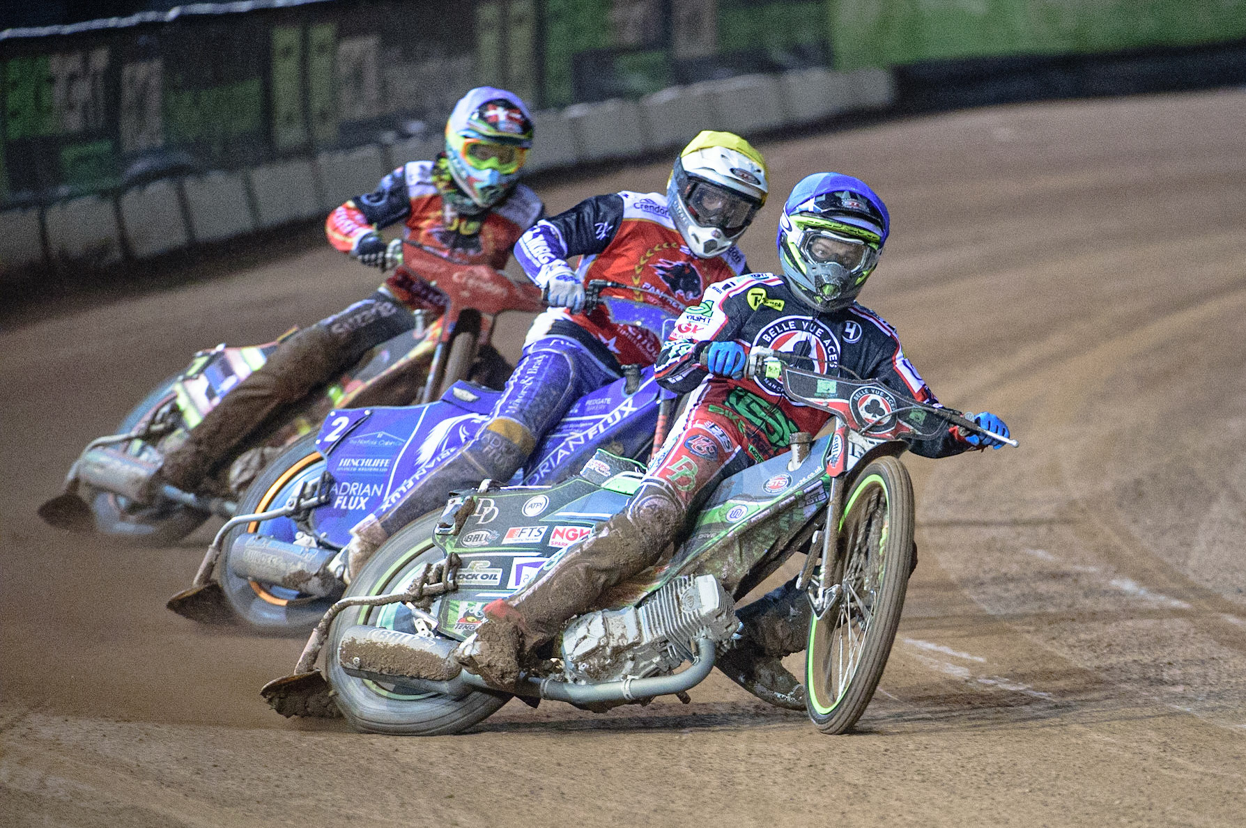 MANCHESTER, UK. OCT 11TH  Charles Wright  (Blue) leads Lewis Kerr  (Yellow) and Michael Palm Toft  (White) during the SGB Premiership Grand Final 1st Leg between Belle Vue Aces and Peterborough Panthers at the National Speedway Stadium, Manchester on Monday 11th October 2021. (Credit: Ian Charles | MI News)