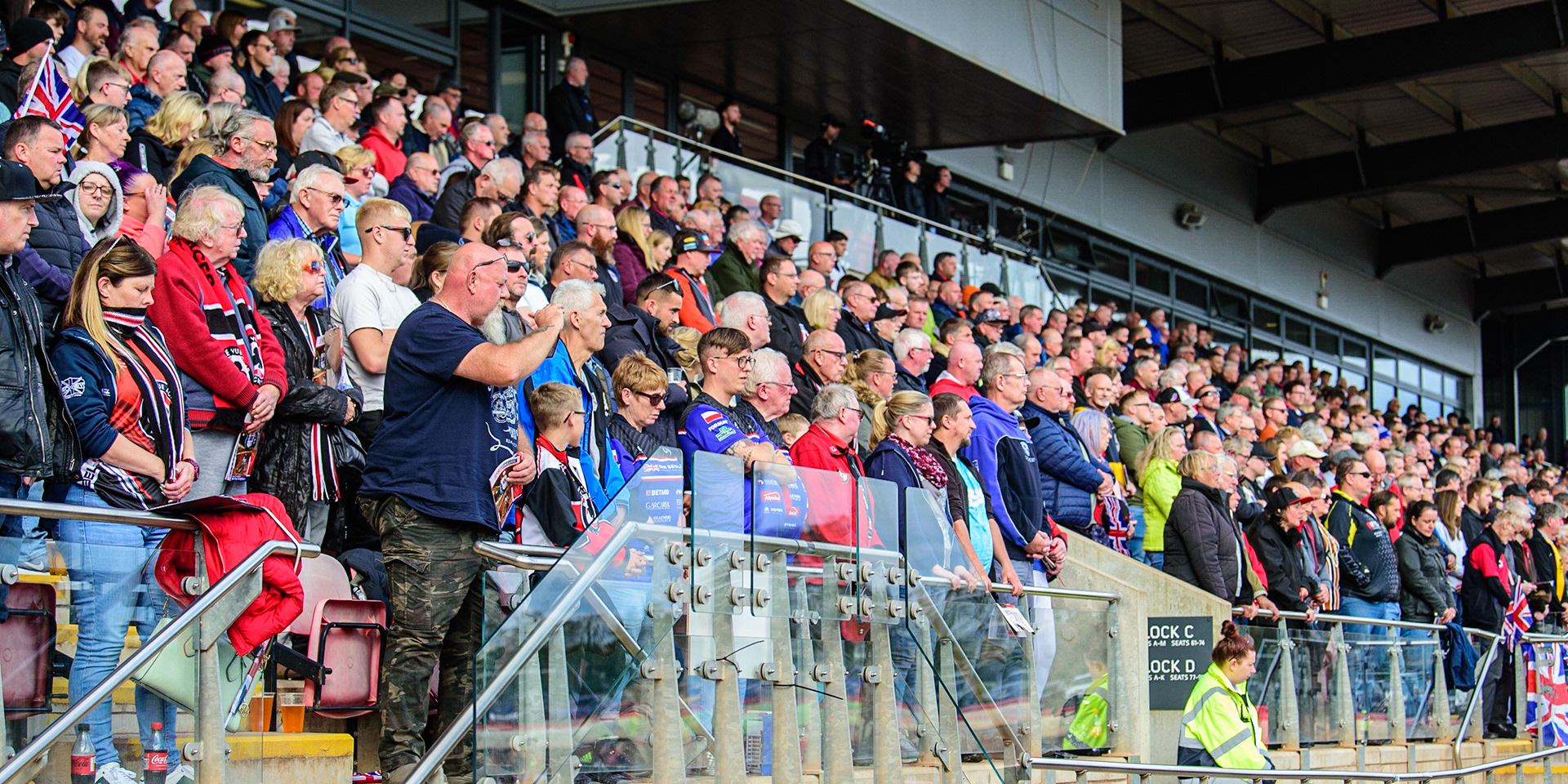 The fans observe the minute’s silence for HM Queen Elizabeth II during the Sports Insure British Speedway Final, at the National Speedway Stadium, Manchester, on Sunday 18th September 2022. (Credit: Ian Charles | MI News )