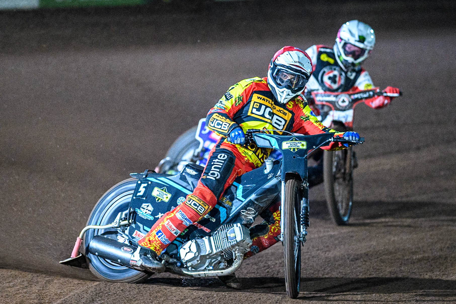Leicester Lions' Ryan Douglas in Red leading Belle Vue Aces' Dan Bewley in White during the Rowe Motor Oil Premiership Grand Final 2nd Leg between Leicester Lions and Belle Vue Aces at the Pidcock Motorcycles Arena, Leicester on Thursday 26th September 2024. (Photo: Ian Charles | MI News)