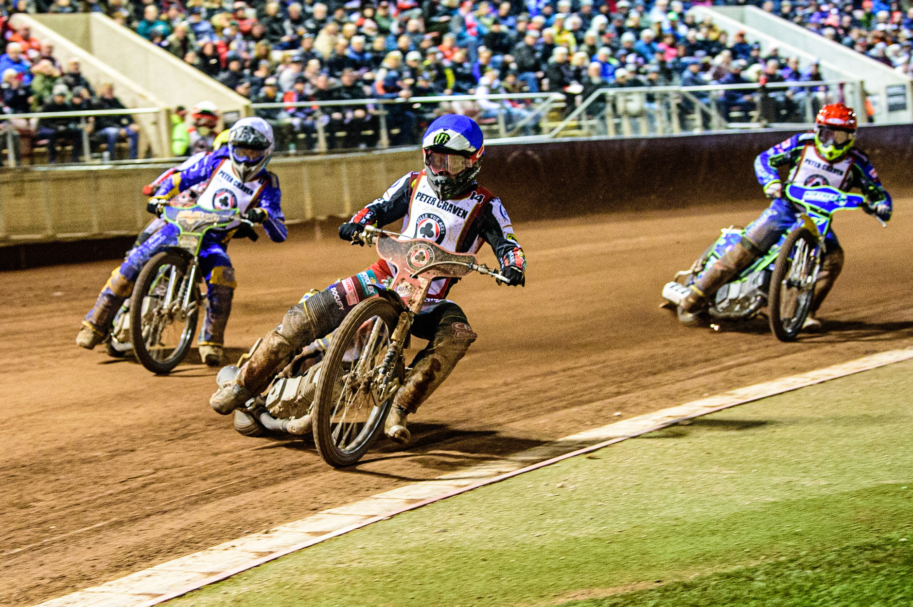 Jaimon Lidsey  (Blue) leads Kye Thompson  (White), Brady Kurtz  (Yellow) and Chris Harris  (Red) during the Peter Craven Memorial Trophy  at the National Speedway Stadium, Manchester on Monday 3rd April 2023. (Photo: Ian Charles | MI News)