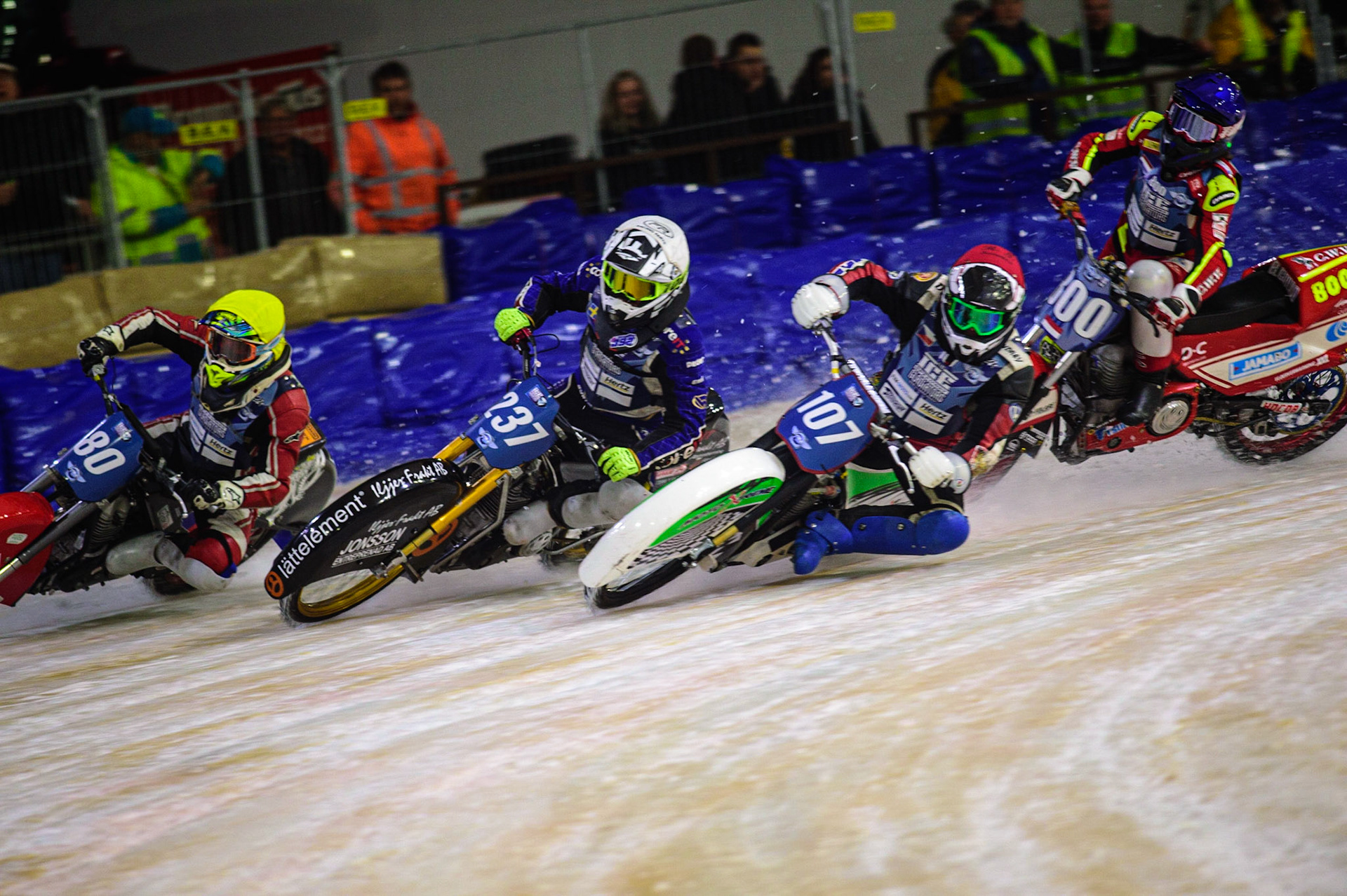 HEERENVEEN, NL. Jasper Iwema (800) (Blue) gets into some difficulty behind Andrej Divis (107) (Red) Jimmy Hörrnell (237)  (White) and Jiri Wildt (80) (Yellow)  during the FIM Ice Speedway Gladiators World Championship Final 4 at Ice Rink Thialf, Heerenveen on Sunday  3 April 2022. (Credit: Ian Charles | MI News)
