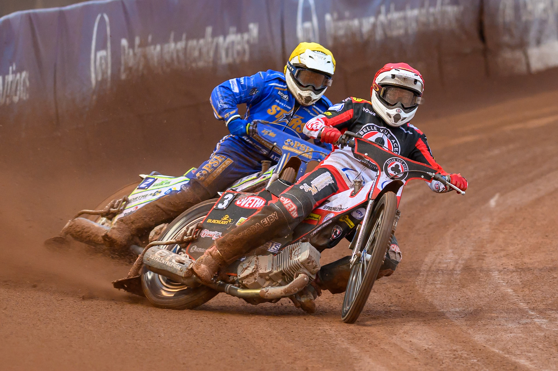 Peter Kildemand of Belle Vue Aces in Red leading Chris Harris of Kings Lynn Stars in Yellow during the Rowe Motor Oil Premiership match between Belle Vue Aces and King's Lynn Stars at the National Speedway Stadium, Manchester on Monday 29th June 2026. (Photo: Ian Charles | MI News)