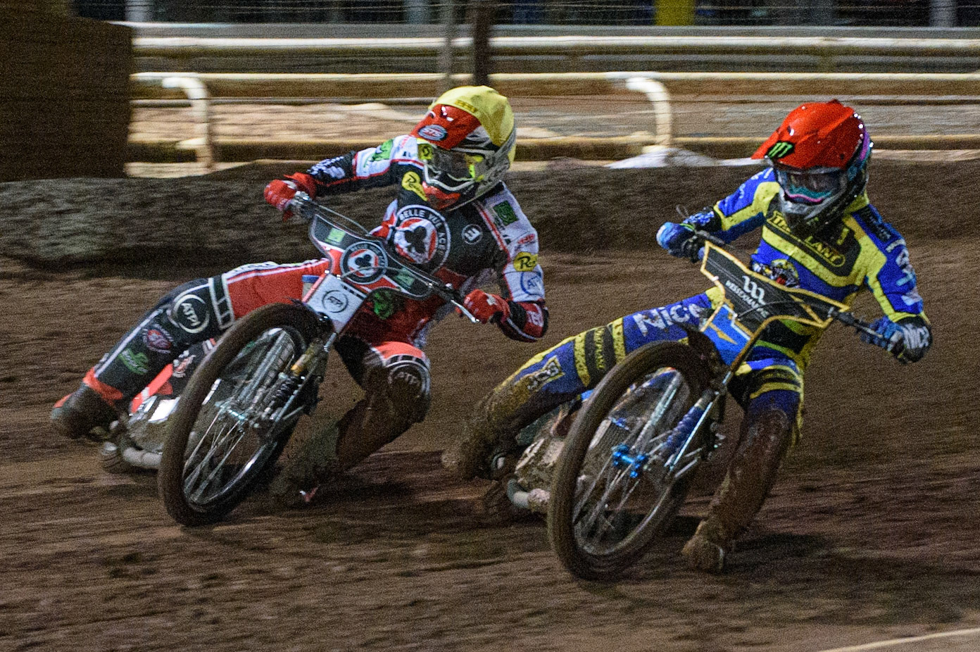 SHEFFIELD, UK. OCT 4THJack Holder  (Red) forces his way past Richie Worrall  (Yellow) during the SGB Premiership Semi Final Playoff 1st Leg between Sheffield Tigers and Belle Vue Aces at Owlerton Stadium, Sheffield on Monday 4th October 2021. (Credit: Ian Charles | MI News)