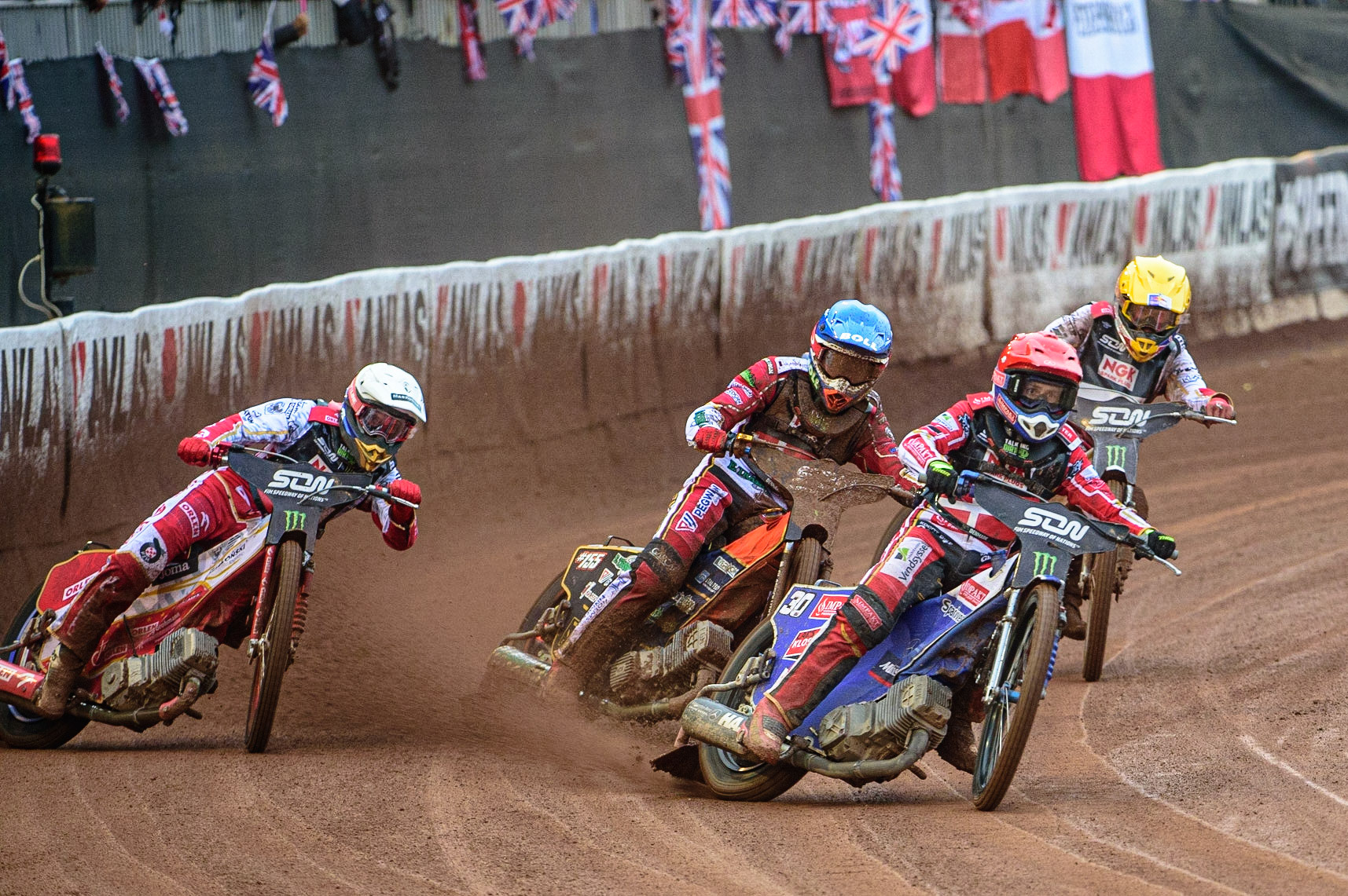 MANCHESTER, UK. OCT 17TH Leon Madsen of Denmark (Red) leads Bartosz Zmarzlik of Poland (White), Mikkel Michelsen of Denmark (Blue) and Maciej Janowski of Poland (Yellow) during the Monster Energy FIM Speedway of Nations at the National Speedway Stadium, Manchester on Sunday  17th October 2021. (Credit: Ian Charles | MI News)