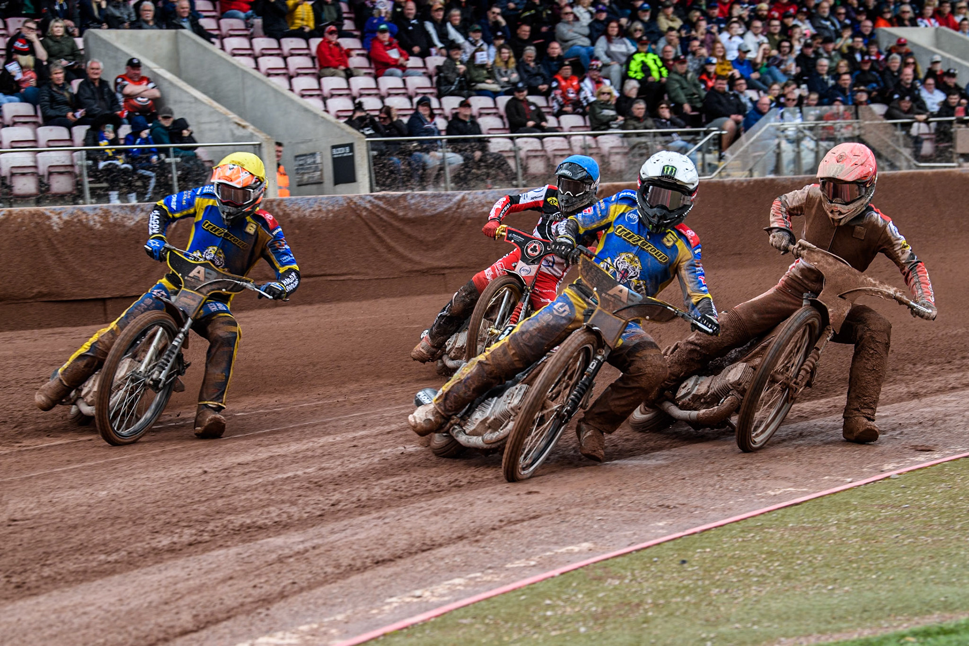Sheffield Tigers' Tai Woffinden in White leading Belle Vue Aces' Jaimon Lidsey in Red, Sheffield Tigers' Jason Edwards in Yellow and Belle Vue Aces' Norick Blodorn in Blue during the Rowe Motor Oil Premiership match between Belle Vue Aces and Sheffield Tigers at the National Speedway Stadium, Manchester on Monday 27th May 2024. (Photo: Ian Charles | MI News)