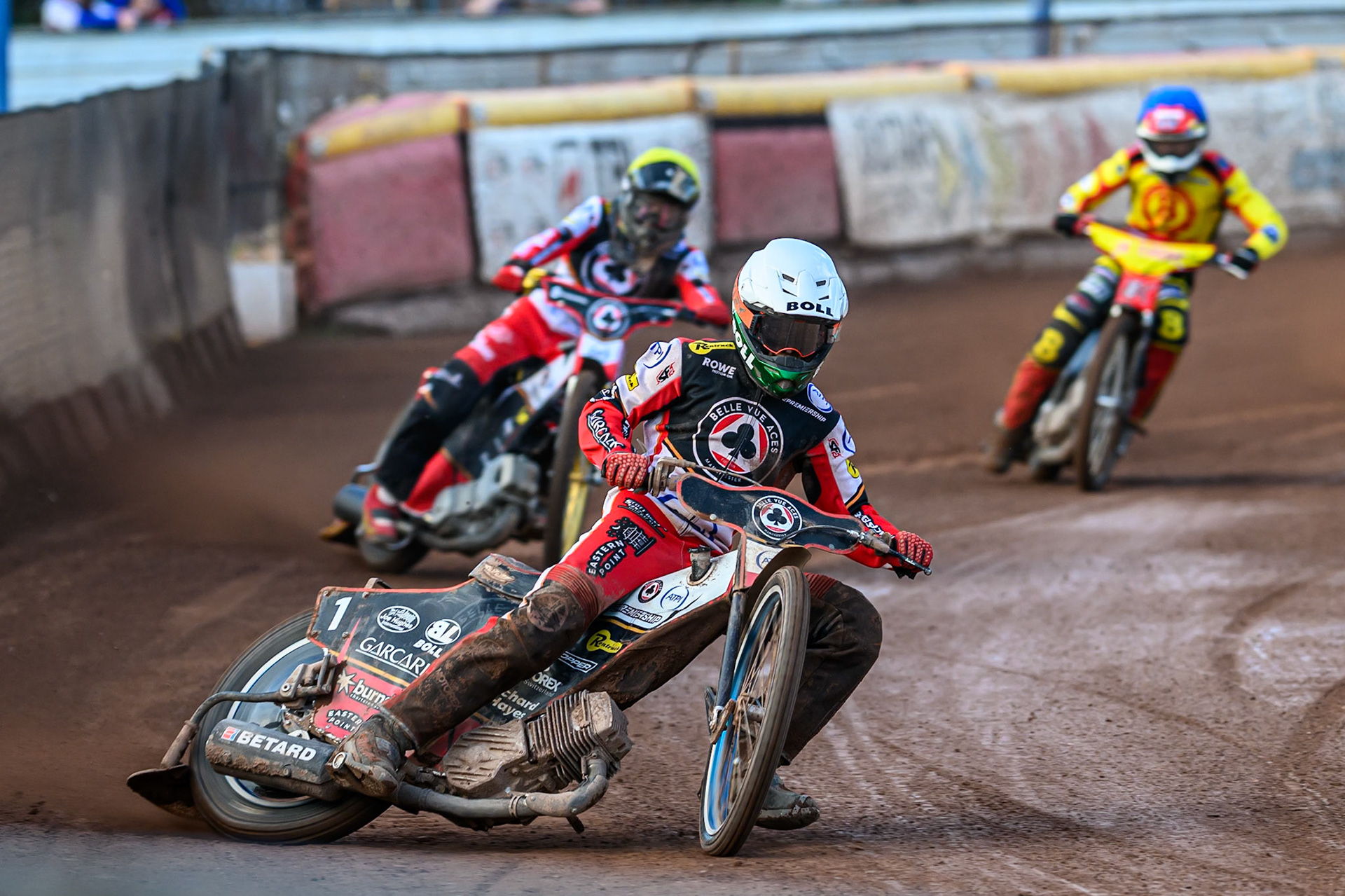 Belle Vue Aces' Brady Kurtz in White leading Belle Vue Aces' Norick Blodorn   in Yellow and Birmingham Brummies' Keynan Rew  in Blue during the Rowe Motor Oil Premiership match between Birmingham Brummies and Belle Vue Aces at Perry Barr Stadium, Birmingham on Monday 28th July 2025. (Photo: Ian Charles | MI News)