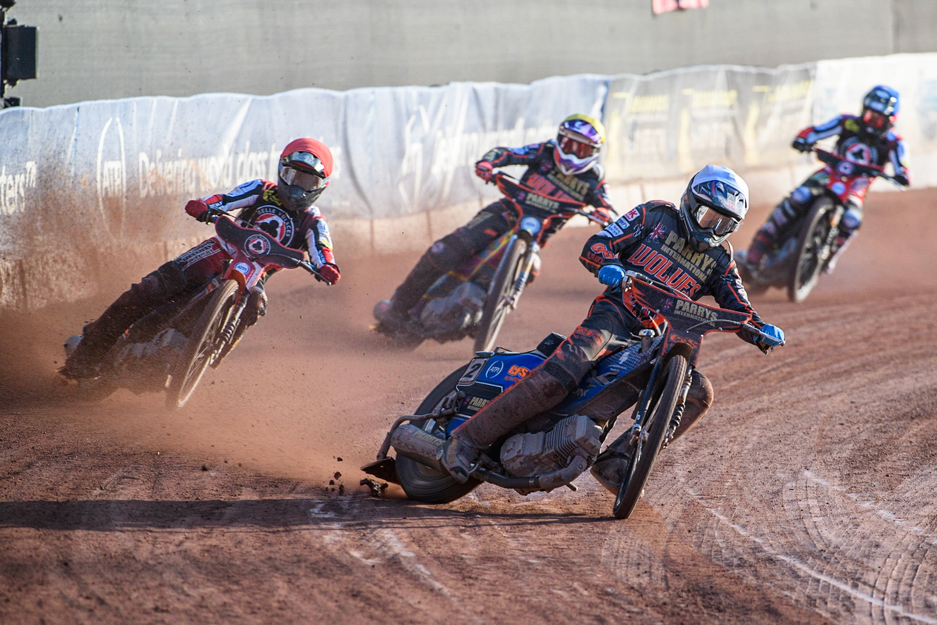 Steve Worrall (White) leads Brady Kurtz (Red) Rory Schlein (Yellow) and Tom Brennan (Blue) during the Sports Insure Premiership match between Belle Vue Aces and Wolverhampton Wolves at the National Speedway Stadium, Manchester on Monday 3rd July 2023. (Photo: Ian Charles | MI News)
