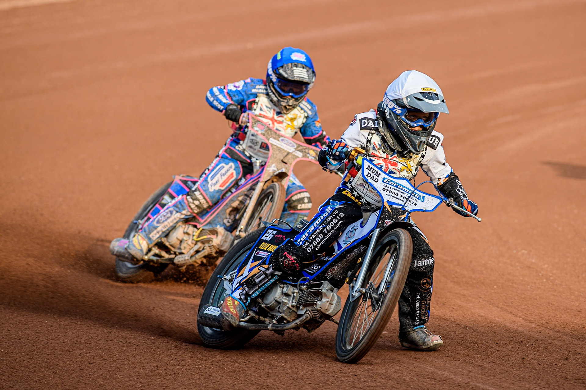 Reuben Marsh (125cc) in White leading Rocco Webb (125cc) in Blue during the British Youth 250cc Championships at the National Speedway Stadium, Manchester on Friday 30th August 2024. (Photo: Ian Charles | MI News)