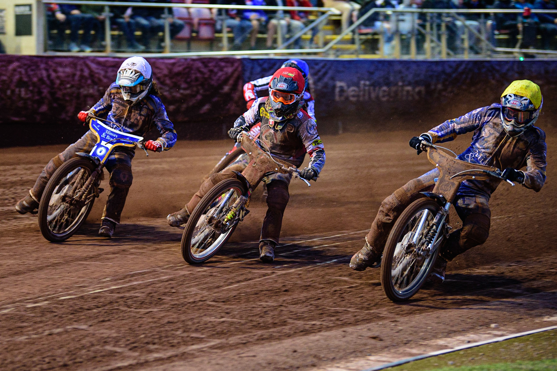 MANCHESTER, UK. MAY 16TH Richie Worrall  (Yellow) inside Charles Wright (Red) and Lewis Kerr  (White) with Norick Blödorn  (Blue) behind during the SGB Premiership match between Belle Vue Aces and King's Lynn Stars at the National Speedway Stadium, Manchester on Monday 16th May 2022. (Credit: Ian Charles | MI News)