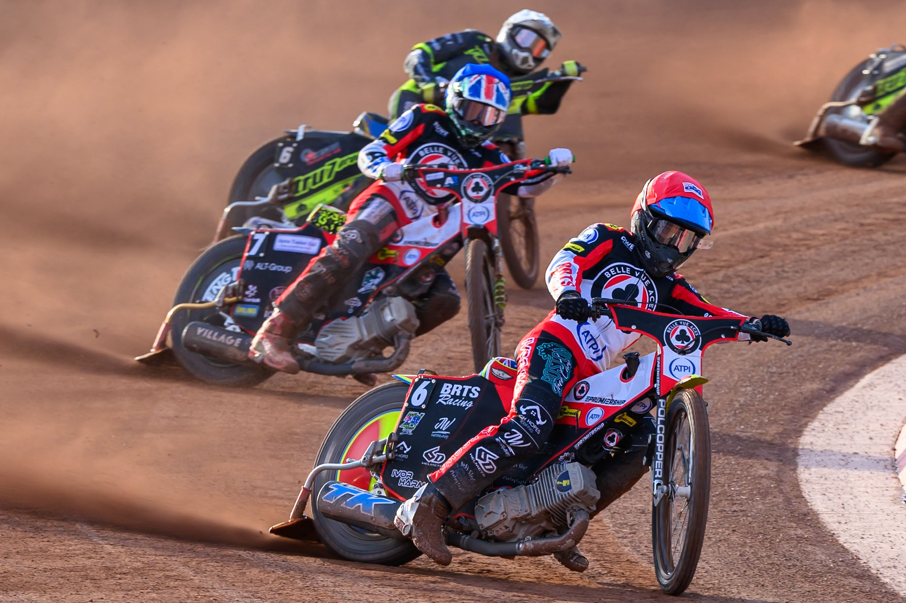Tate Zischke of Belle Vue Aces in Red leading William Cairns of Belle Vue Aces in Blue and Philip Hellstrom-Bangs of Ipswich Witches in White during the Rowe Motor Oil Premiership match between Belle Vue Aces and Ipswich Witches at the National Speedway Stadium, Manchester on Saturday 20th June 2026. (Photo: Ian Charles | MI News)
