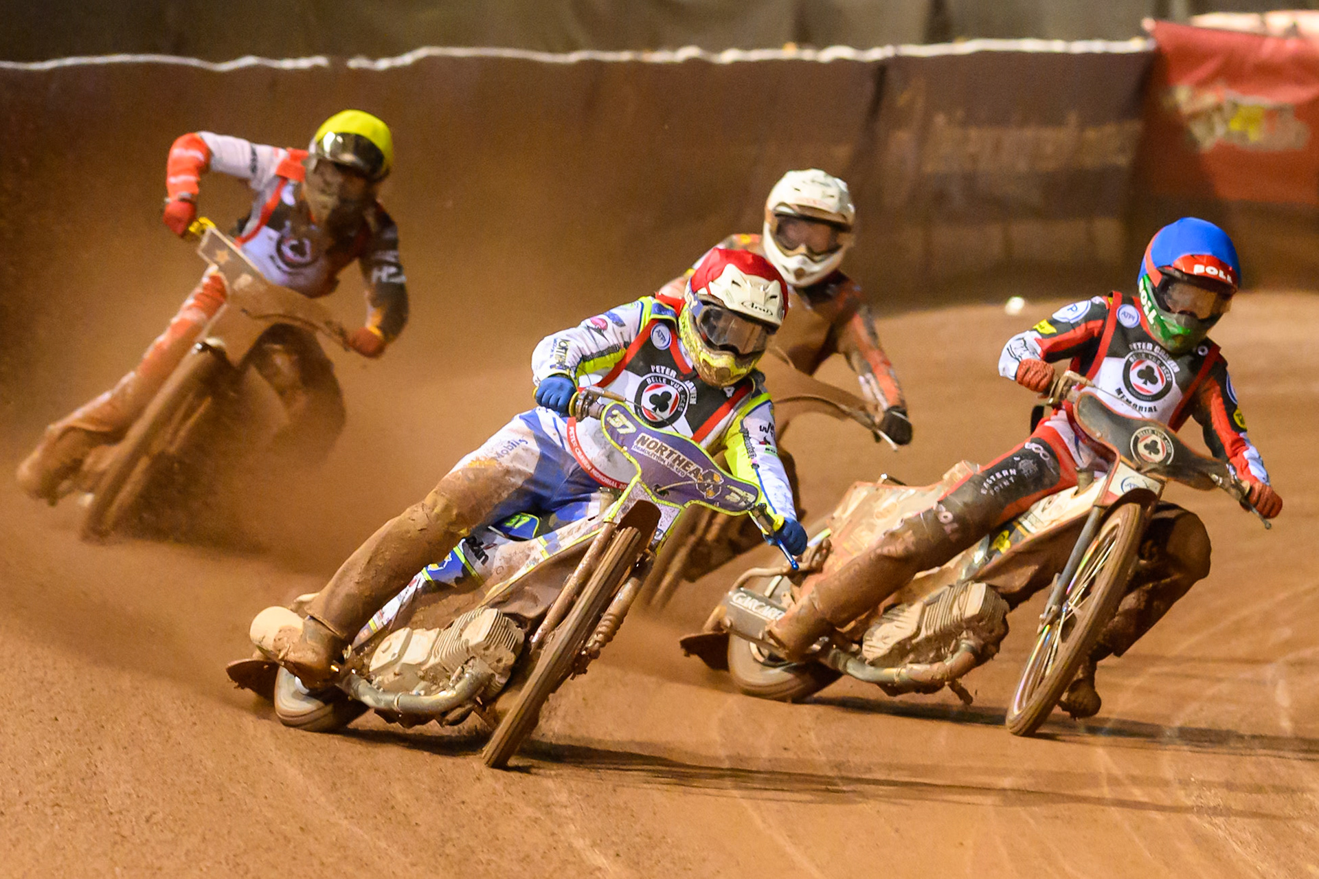 Chris Harris  in Red leading Brady Kurtz  in Blue, Peter Kildemand  in White and Norick Blodorn in Yellow  during the Peter Craven Memorial Trophy at the National Speedway Stadium, Manchester, on Monday 16th March 2026. (Photo: Ian Charles | MI News)