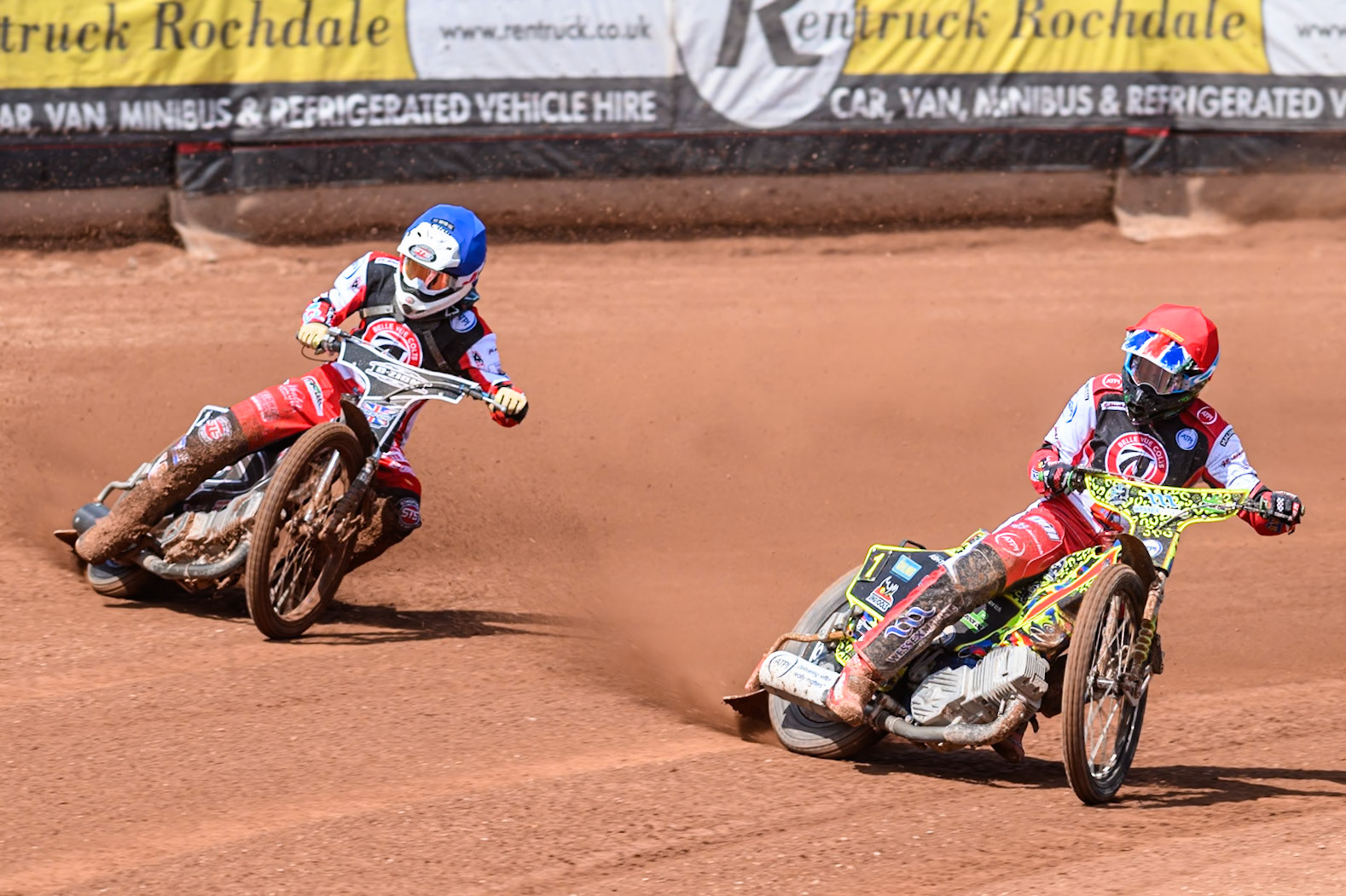 Jack Shimelt of Belle Vue Colts  in Blue rides outside William Cairns of Belle Vue Colts in Red during the WSRA National Development League match between Belle Vue Colts and Middlesbrough Tigers at the National Speedway Stadium, Manchester on Sunday 10th August 2025. (Photo: Mark Fletcher | MI News)