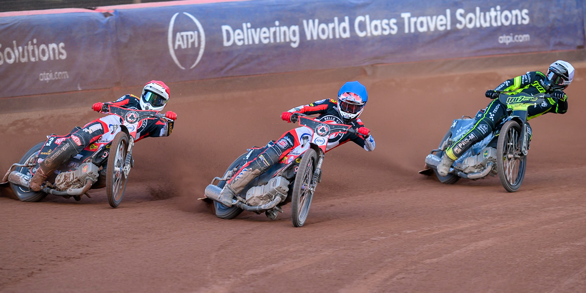 Peter Kildemand of Belle Vue Aces in Red and Zach Cook of Belle Vue Aces in Blue leading Tobiasz Musielak of Ipswich Witches in White during the Rowe Motor Oil Premiership match between Belle Vue Aces and Ipswich Witches at the National Speedway Stadium, Manchester on Saturday 20th June 2026. (Photo: Ian Charles | MI News)