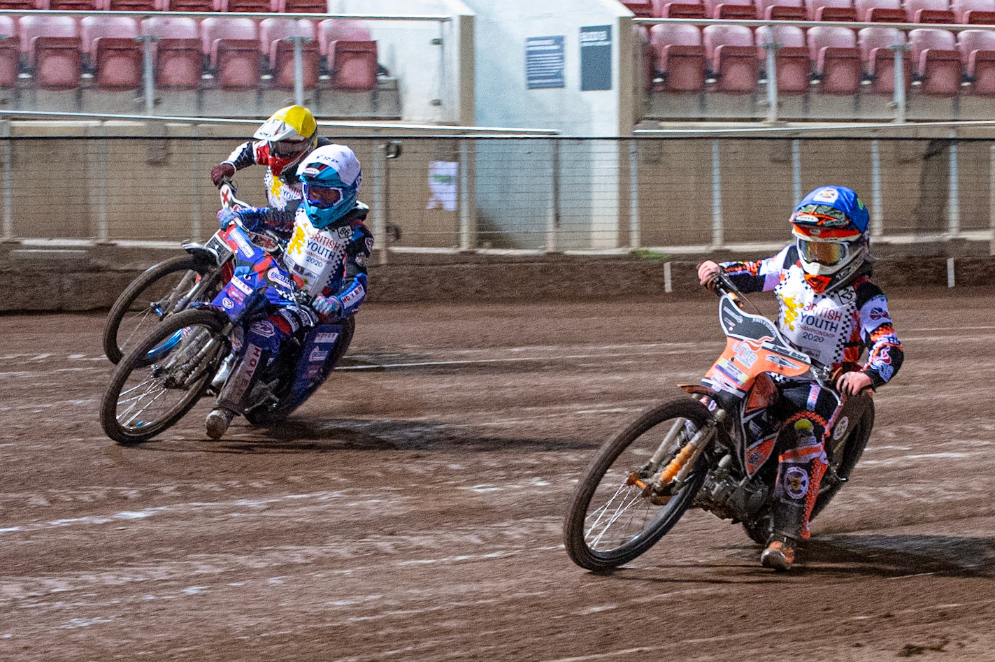 Photo: Ian CharlesBen Trigger (Blue) inside Sonny Springer (White) and William Cairns (Yellow) (125cc A Class)British Youth Speedway Championship (Round 5), National Speedway Stadium, Manchester Saturday  10  October  2020