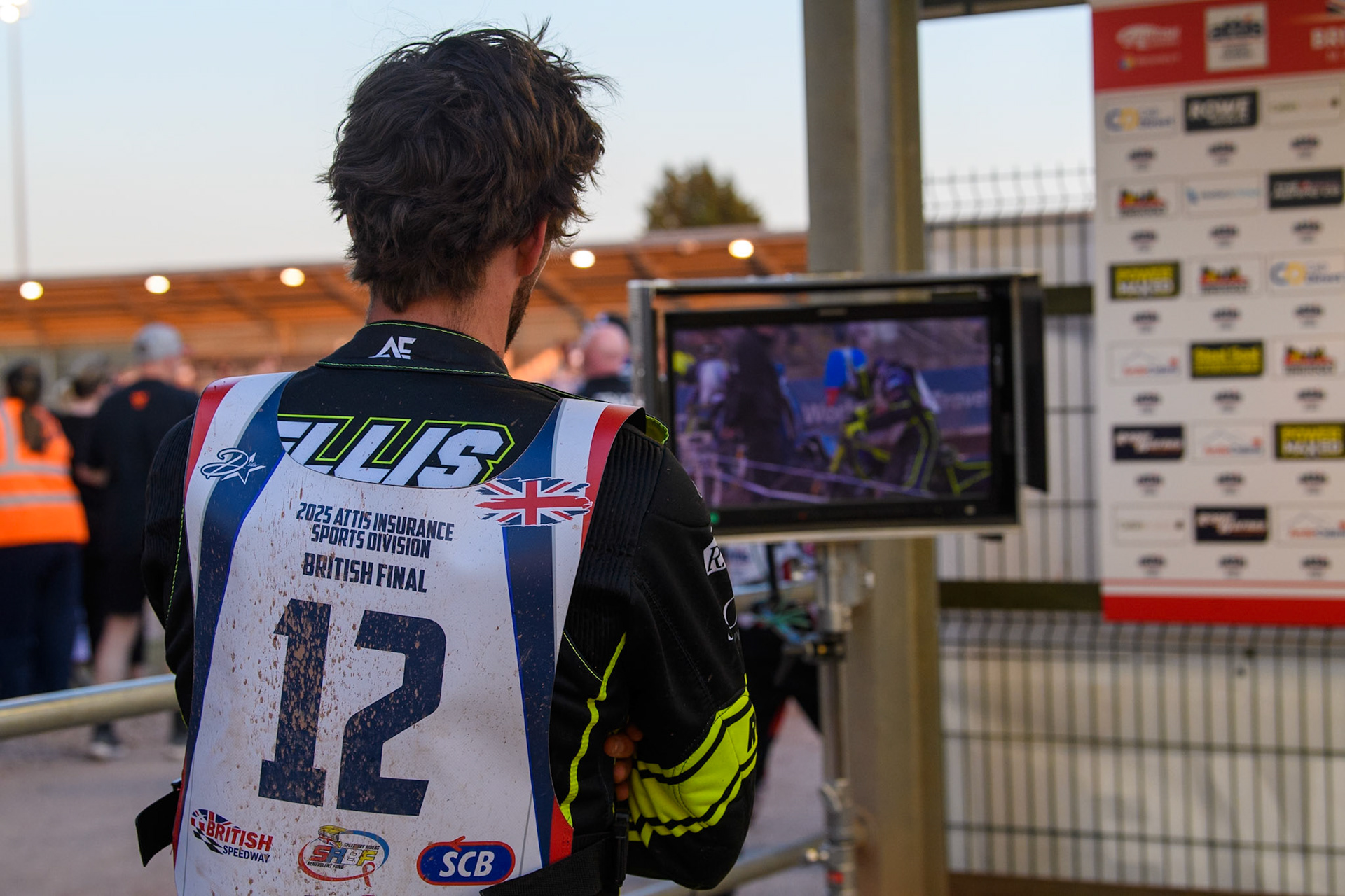 Adam Ellis watches the TV Monitor in the pits during the Attis Insurance Sports Division British Final at the National Speedway Stadium, Manchester on Monday 12th May 2025. (Photo: Ian Charles | MI News)