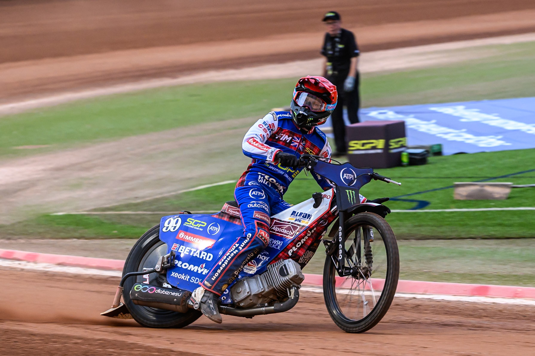 Dan Bewley (99) of Great Britain celebrates early as he wins the 2nd Last Chance Qualifier during the ATPI FIM Speedway Grand Prix Round 4 at the National Speedway Stadium, Manchester, on Friday 13th June 2025. (Photo: Ian Charles | MI News)