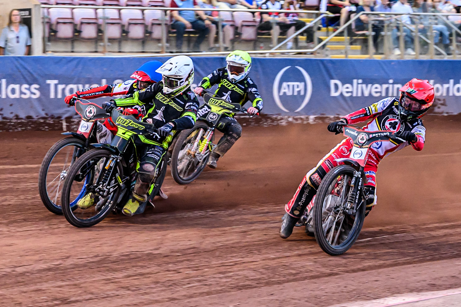 Belle Vue Aces' Dan Bewley  in Red rides inside Ipswich Witches' Tom Brennan  in White and Belle Vue Aces' Brady Kurtz  in Blue with Ipswich Witches' Emil Saifutdinov  in Yellow behind during the Rowe Motor Oil Premiership match between Belle Vue Aces and Ipswich Witches at the National Speedway Stadium, Manchester on Monday 30th June 2025. (Photo: Ian Charles | MI News)