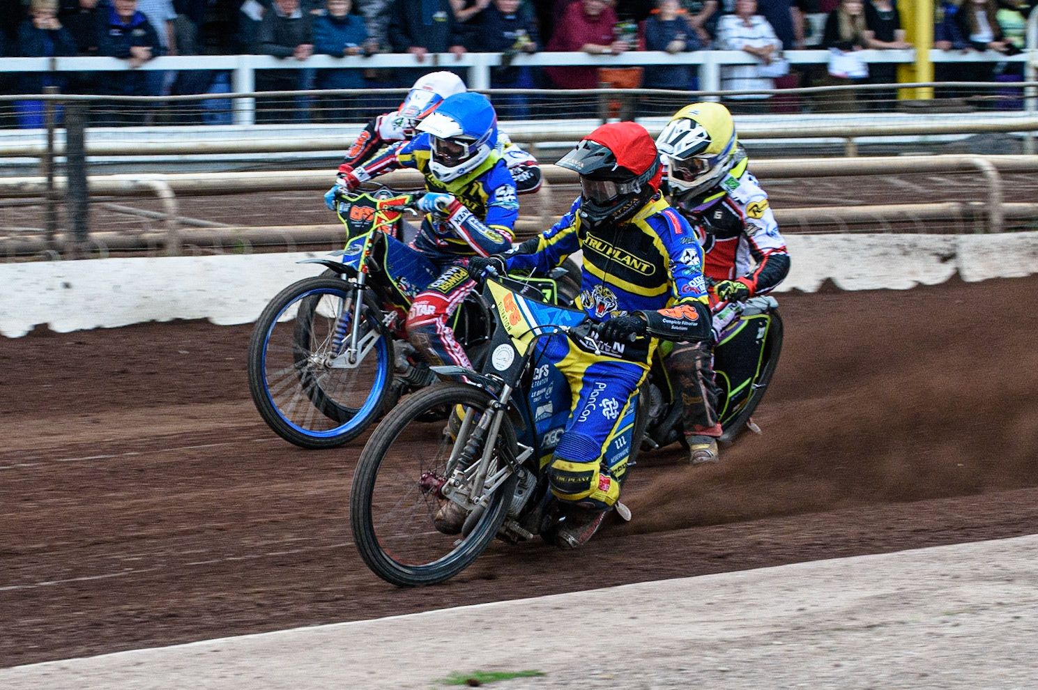 SHEFFIELD, UK. JULY 1ST     Adam Ellis  (Red) inside Anders Rowe (Blue), Tom Brennan  (Yellow) and Adam Ellis  (White) during the SGB Premiership match between Sheffield Tigers and Belle Vue Aces at Owlerton Stadium, Sheffield on Thursday 1st July 2021. (Credit: Ian Charles | MI News)