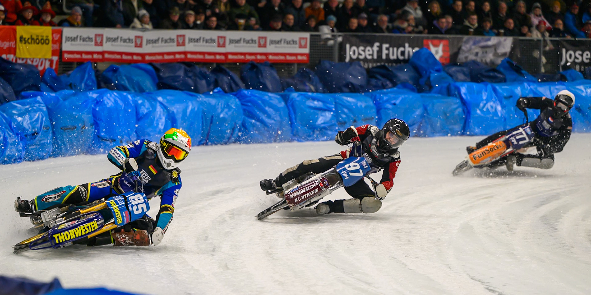 Luca Bauer (85) of Italy/Germany  in Yellow leading Ove Ledström (97) of Sweden  in Blue and Leon Kramer (777) of The Netherlands  in White during the Ice Speedway Gladiators World Championship Final 1 at Max-Aicher-Arena, Inzell on Saturday 14th March 2026. (Photo: Ian Charles | MI News)