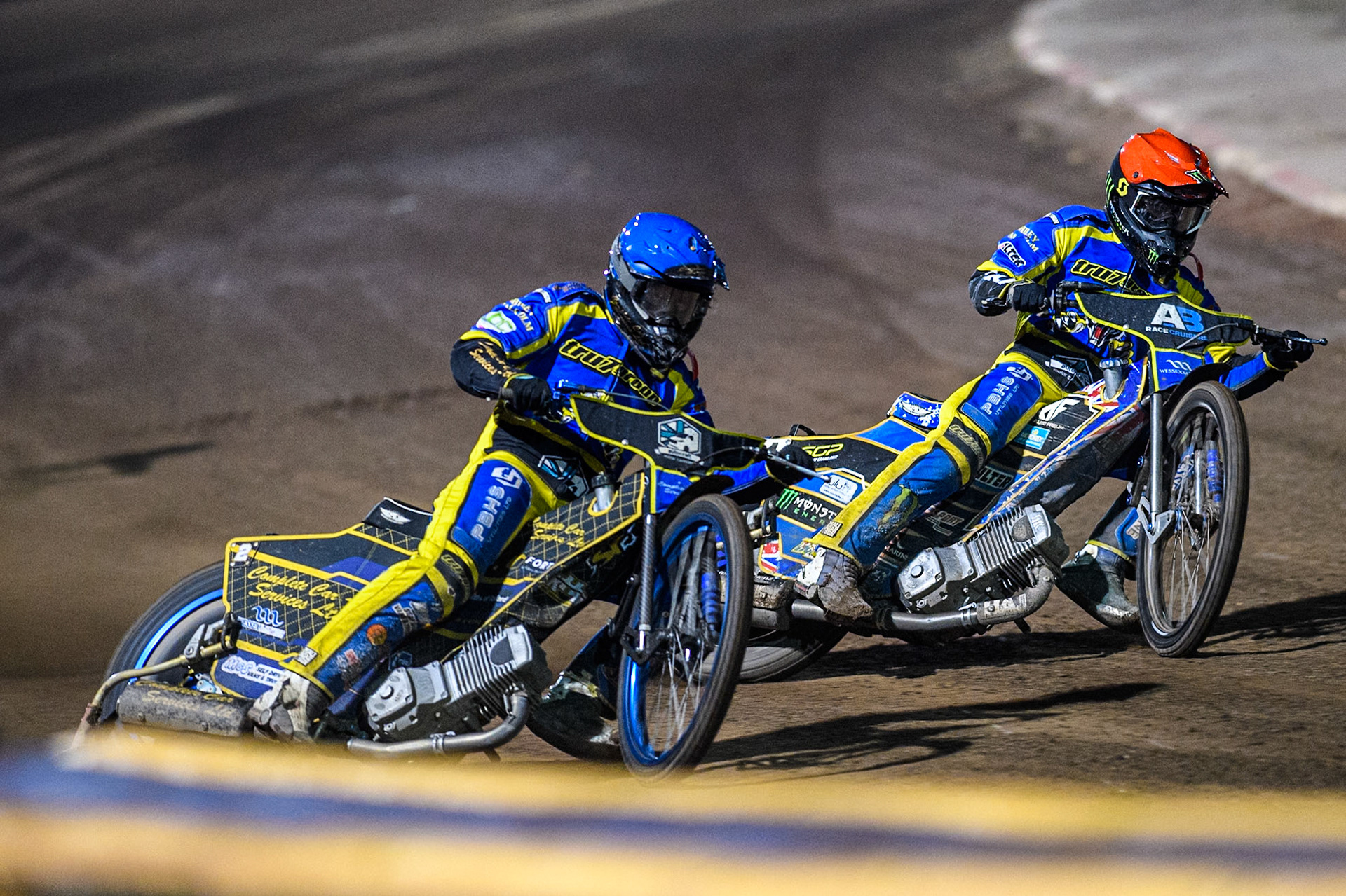 Sheffield Tigers' Kyle Howarth  in Blue rides outside team mate Jack Holder during the Rowe Motor Oil Premiership Play Off Semi Final 2nd leg between Sheffield Tigers and Belle Vue Aces at Owlerton Stadium, Sheffield on Thursday 19th September 2024. (Photo: Ian Charles | MI News)