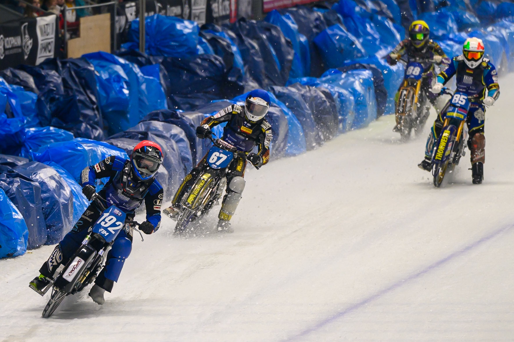 Last Chance Heat: Niclas Svensson (192) of Sweden  in Red leading Heikki Huusko (67) of Finland  in Blue, Luca Bauer (85) of Italy/Germany  in White and  Max Niedermaier (88) of Germany in Yellow during the Ice Speedway Gladiators World Championship Final 1 at Max-Aicher-Arena, Inzell on Saturday 14th March 2026. (Photo: Ian Charles | MI News)