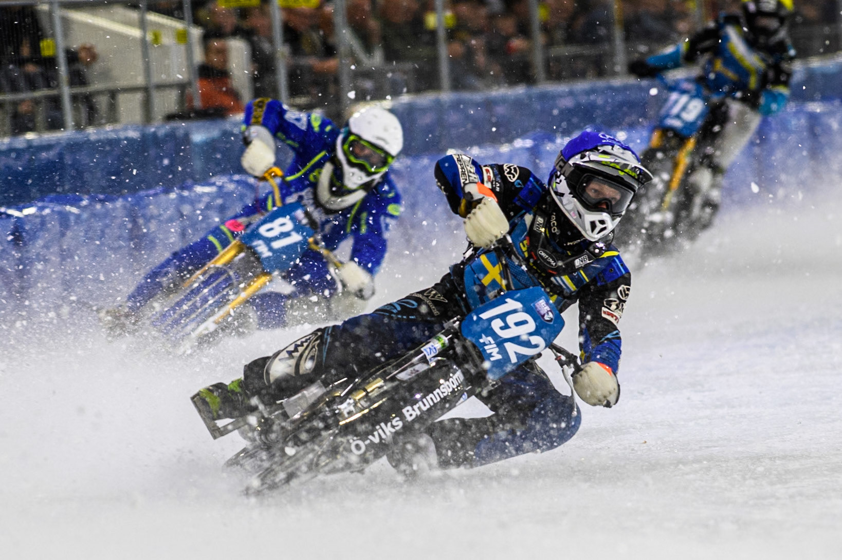 Niclas Svensson (192) of Sweden in Blue leading Jimmy Olsén (81) of Sweden in White and Filip Jäger (719) of Sweden in Yellow during the FIM Ice Speedway Gladiators World Championship, Final 3 at the Ice Stadium, Thialf, Heerenveen on Saturday 5th April 2025. (Photo: Ian Charles | MI News)