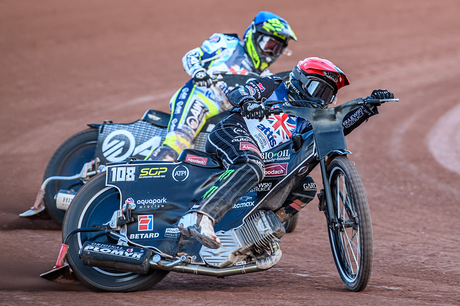 Tai Woffinden in Red leading Lewis Kerr in Blue during the Attis Insurance Sports Division British Speedway Championship Final at the National Speedway Stadium, Manchester on Saturday 8th June 2024. (Photo: Ian Charles | MI News)