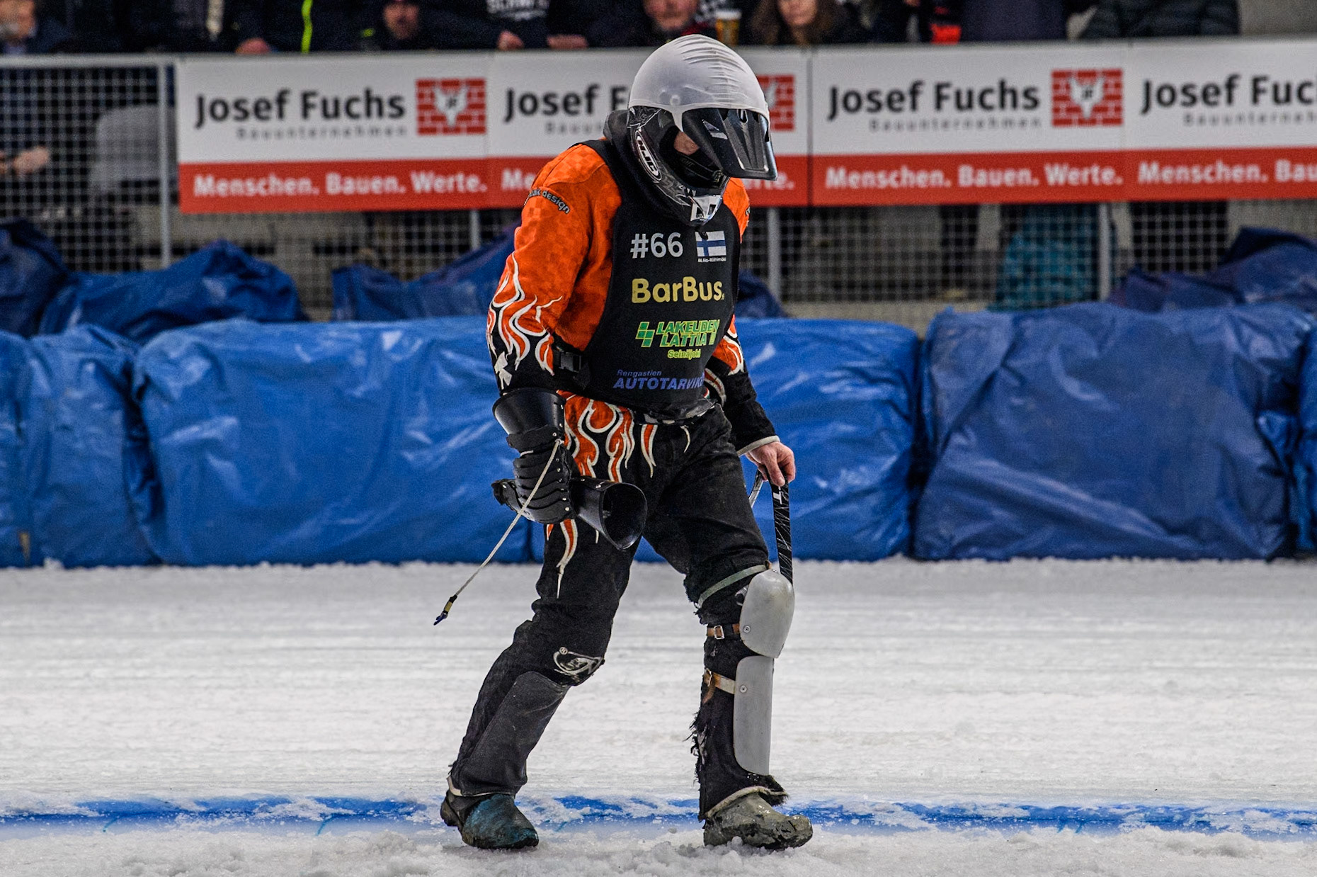 Finland's Aki Ala-Riihimäki (66) walks back to the pits after his first bend fall in the Final during the FIM Ice Speedway Gladiators World Championship Final 2 at the Max-Aicher-Arena, Inzell on Sunday 24 March 2024. (Photo: Ian Charles | MI News)
