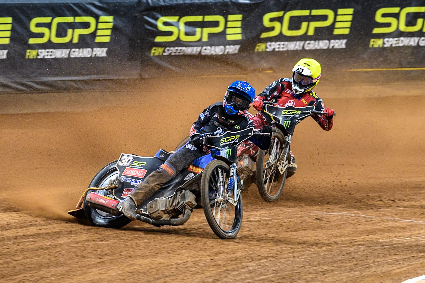 Leon Madsen (30) of Denmark in Blue leading Max Fricke (46) of Australia in Yellow during the FIM Speedway Grand Prix of Great Britain at The Principality Stadium, Cardiff on Saturday 17th August 2024. (Photo: Ian Charles | MI News)