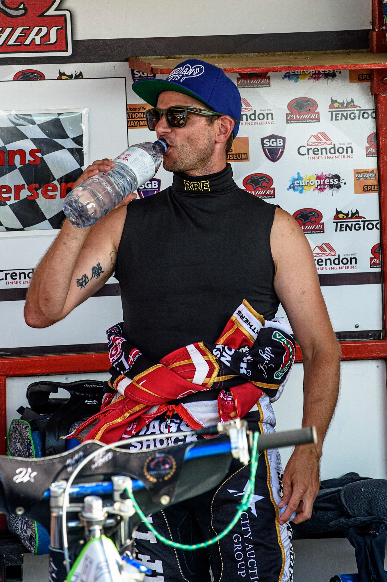 PETERBOROUGH, UK. JULY 19TH  Peterborough Crendon Panthers  Hans Andersen has a quick drink as he warms up his bike during the SGB Premiership match between Peterborough and Belle Vue Aces at East of England Showground, Peterborough on Monday 19th July 2021. (Credit: Ian Charles | MI News)