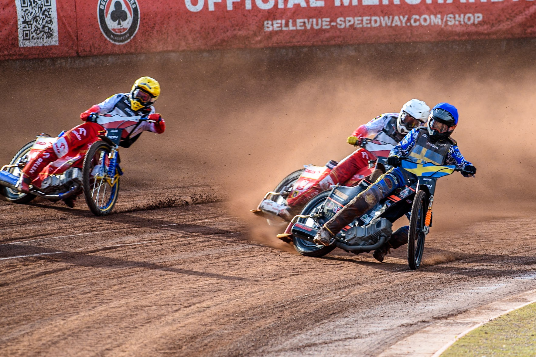 SWEDEN v POLAND: Jacob Thorssell of Sweden in Blue leading Dominik Kubera of Poland in White and Bartosz Zmarzlik of Poland in Yellow  during the Monster Energy FIM Speedway of Nation Final at the National Speedway Stadium, Manchester on Saturday 13th July 2024. (Photo: Ian Charles | MI News)