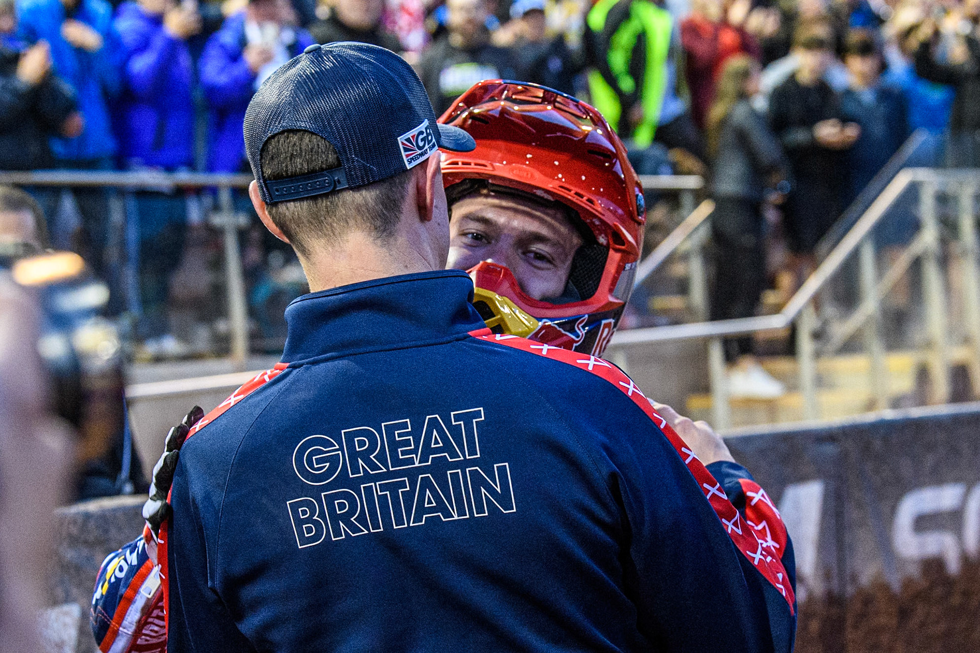Robert Lambert of Great Britain with British Joint Team manager, Simon Stead after the team GB win during the Monster Energy FIM Speedway of Nation Final at the National Speedway Stadium, Manchester on Saturday 13th July 2024. (Photo: Ian Charles | MI News)