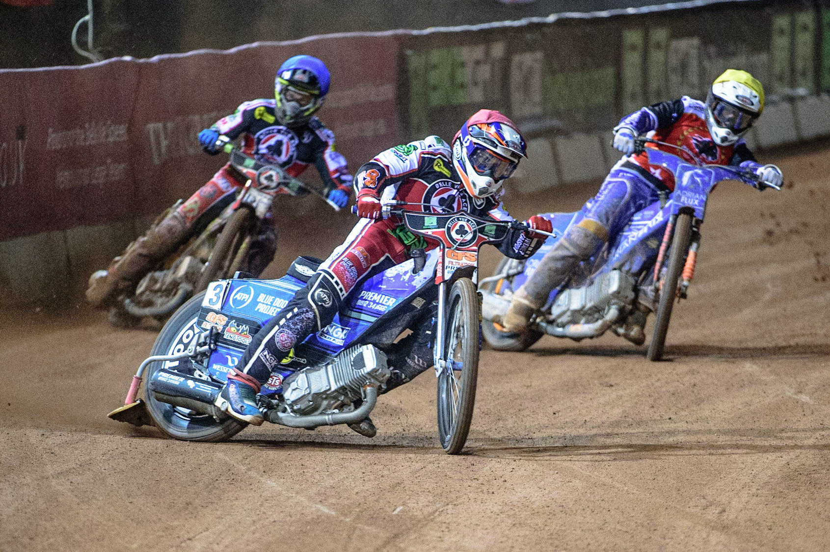 MANCHESTER, UK. OCT 11TH  Steve Worrall   (Red) leads Charles Wright  (Blue) and Lewis Kerr (Yellow) during the SGB Premiership Grand Final 1st Leg between Belle Vue Aces and Peterborough Panthers at the National Speedway Stadium, Manchester on Monday 11th October 2021. (Credit: Ian Charles | MI News)