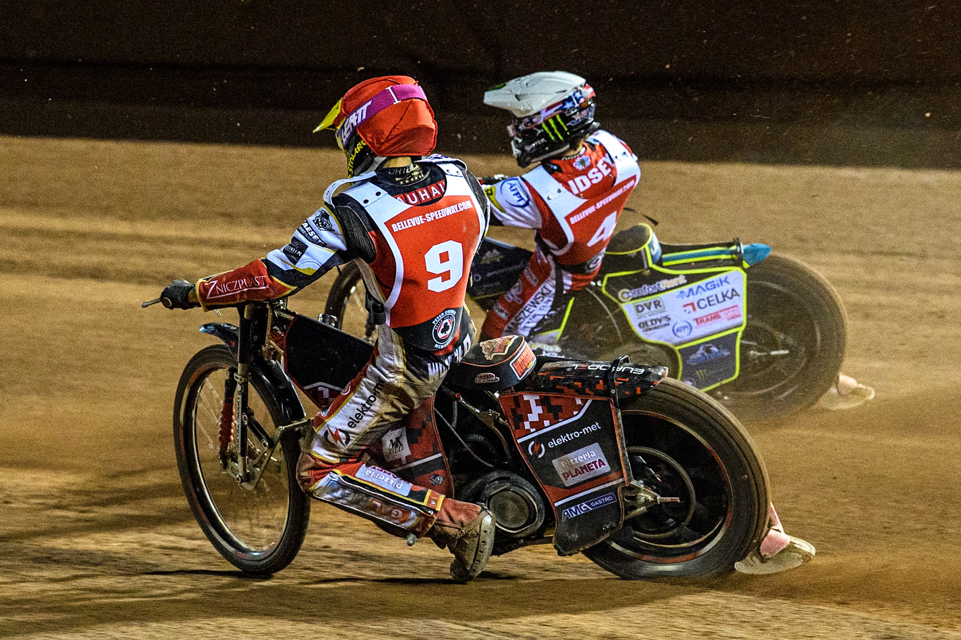 Poland's Patryk Wojdylo (Red) chases Australia's Jaimon Lidsey (White) during the Peter Craven Memorial Trophy meeting at the National Speedway Stadium, Manchester on Monday 18th March 2024. (Photo: Ian Charles | MI News)