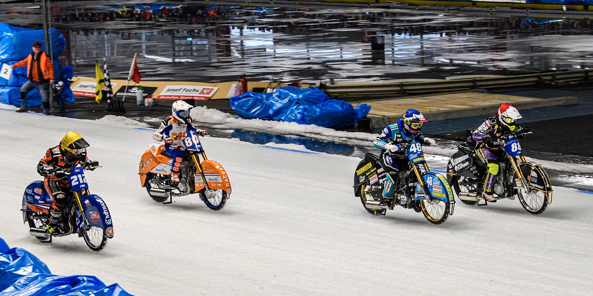 (L to R) Lukas Hutla (212) of the Czech Republic in Yellow, Jasper Iwema (800) of The Netherlands in White, Luca Bauer (48) of Germany in Blue and Max Niedermaier  (88) of Germany in Red during the Ice Speedway Gladiators World Championship Final 2 at Max-Aicher-Arena, Inzell on Sunday 16th March 2025. (Photo: Ian Charles | MI News)