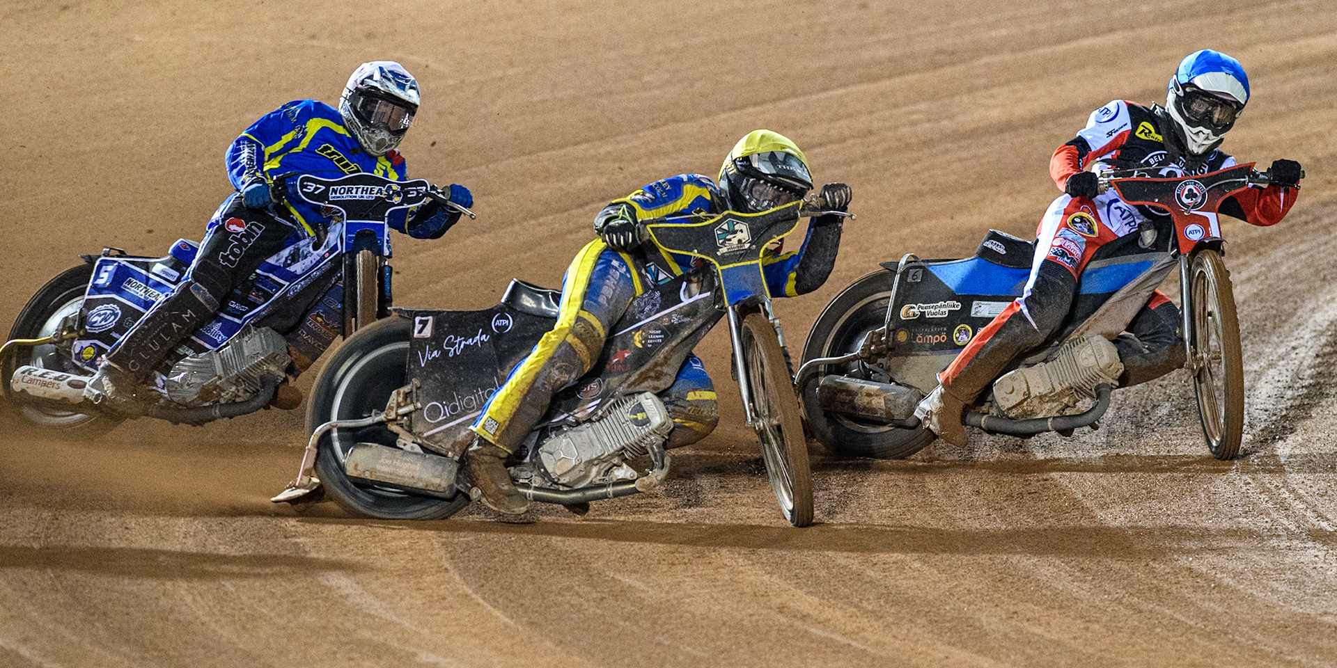 Sheffield Tigers' Dan Gilkes  in Yellow leading Belle Vue Aces' Antti Vuolas  in Blue and Sheffield Tigers' Guest Rider Chris Harris  in White during the Rowe Motor Oil Premiership Play Off Semi Final 2, 1st Leg match between Belle Vue Aces and Sheffield Tigers at the National Speedway Stadium, Manchester on Monday 16th September 2024. (Photo: Ian Charles | MI News)