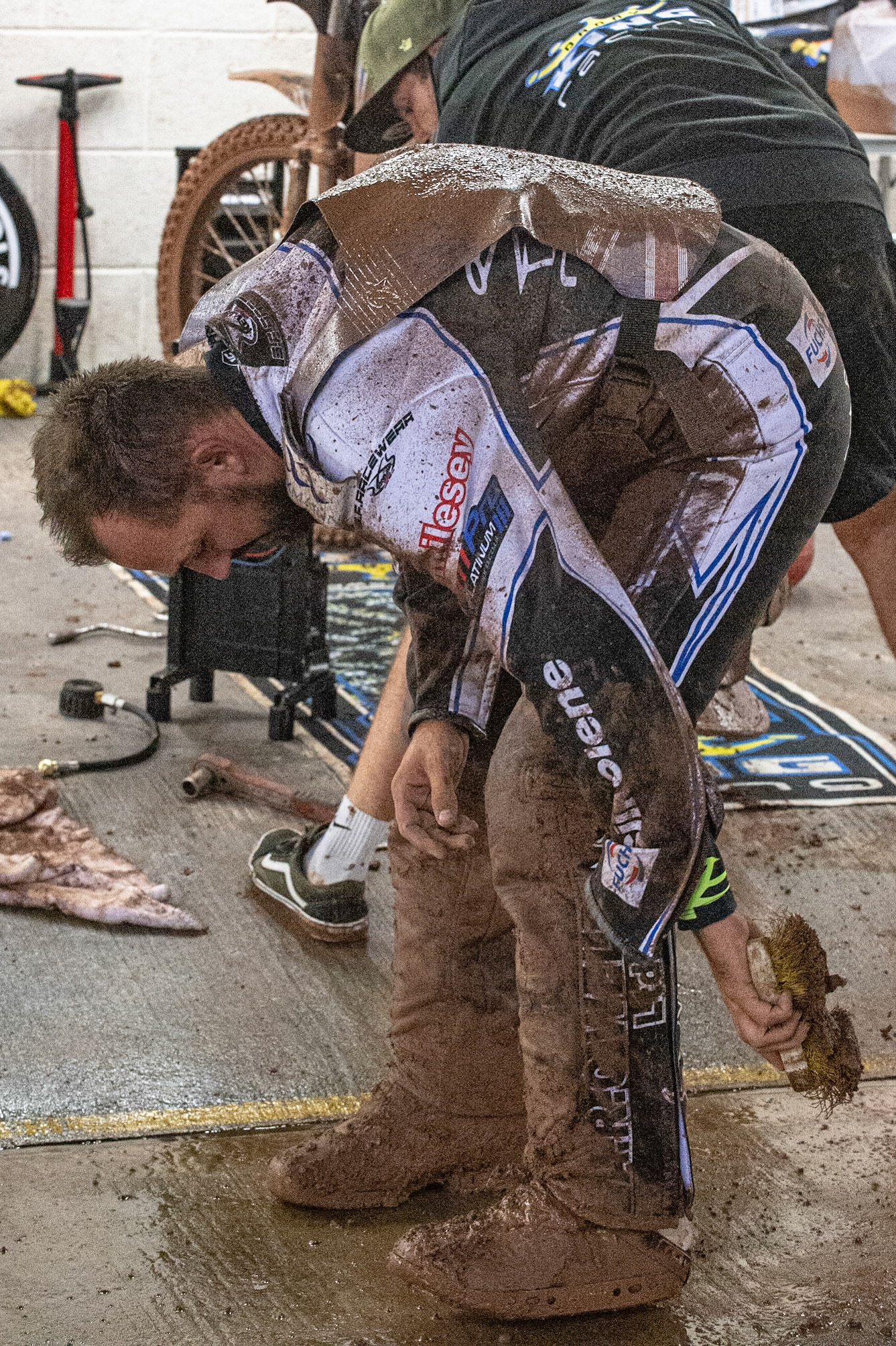 Photo: Ian CharlesDanny King cleans off the wet shale from his kevlarsSports Insure British Speedway Championship Final, National Speedway Stadium, Manchester Monday  28  September  2020