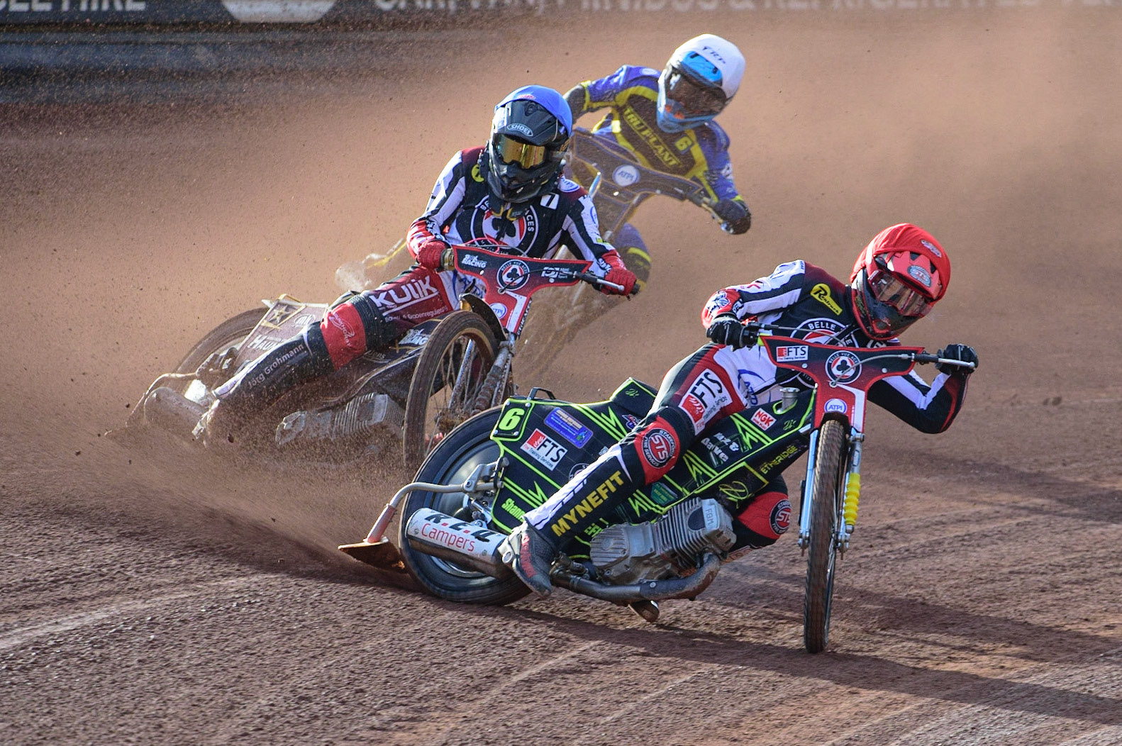 MANCHESTER, UK. JUL 5TH  Jye Etheridge  (Red) leads Norick Blodorn  (Blue) and Justin Sedgmen  (White) during the SGB Premiership match between Belle Vue Aces and Sheffield Tigers at the National Speedway Stadium, Manchester on Tuesday 5th July 2022. (Credit: Ian Charles | MI News)