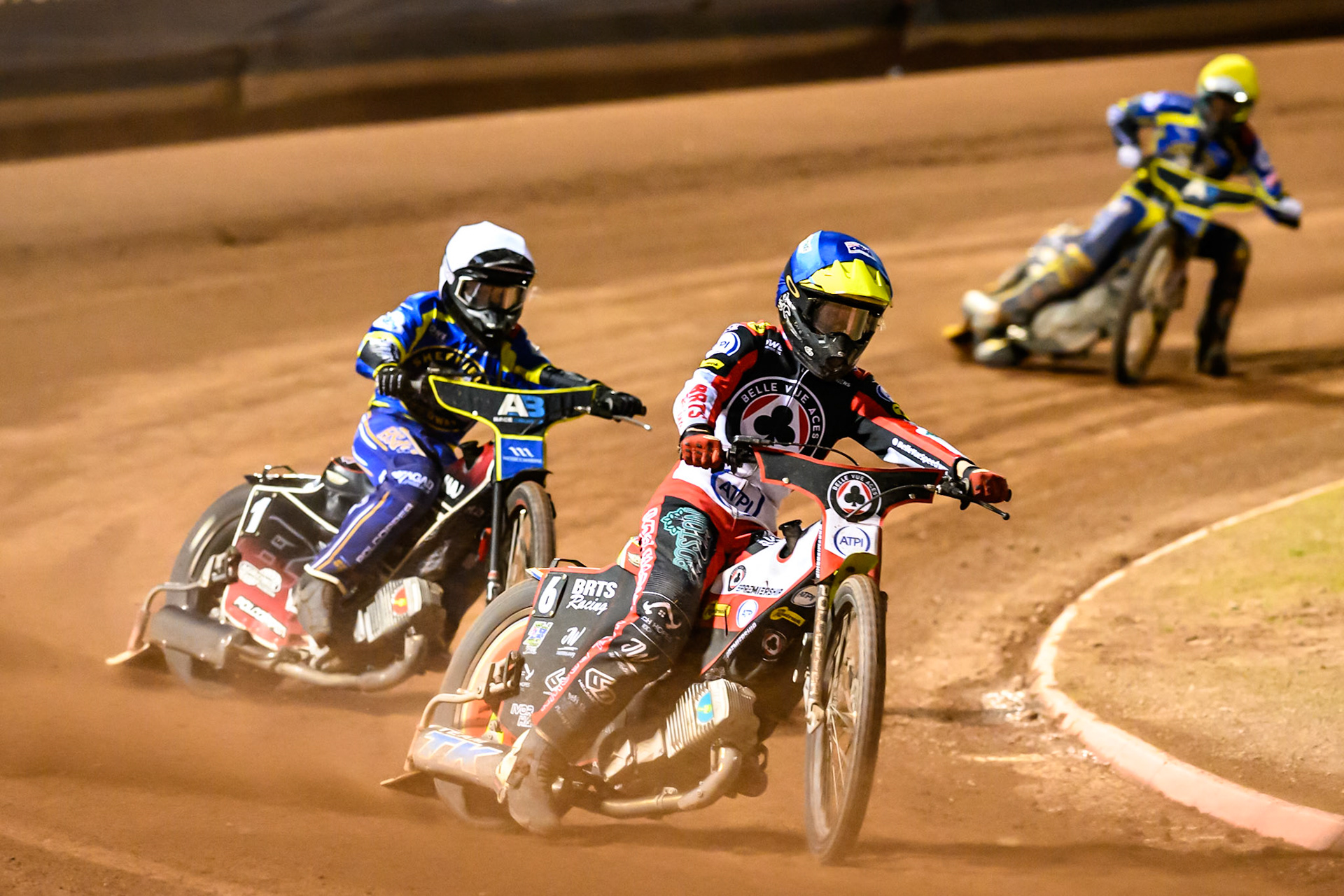 Tate Zischke of Belle Vue Aces in Blue leading Ben Cook, Guest Rider for Sheffield Tigers in White and Anders Rowe of Sheffield Tigers in Yellow during the Rowe Motor Oil Premiership match between Belle Vue Aces and Sheffield Tigers at the National Speedway Stadium, Manchester on Monday 14th September 2026. (Photo: Ian Charles | MI News)