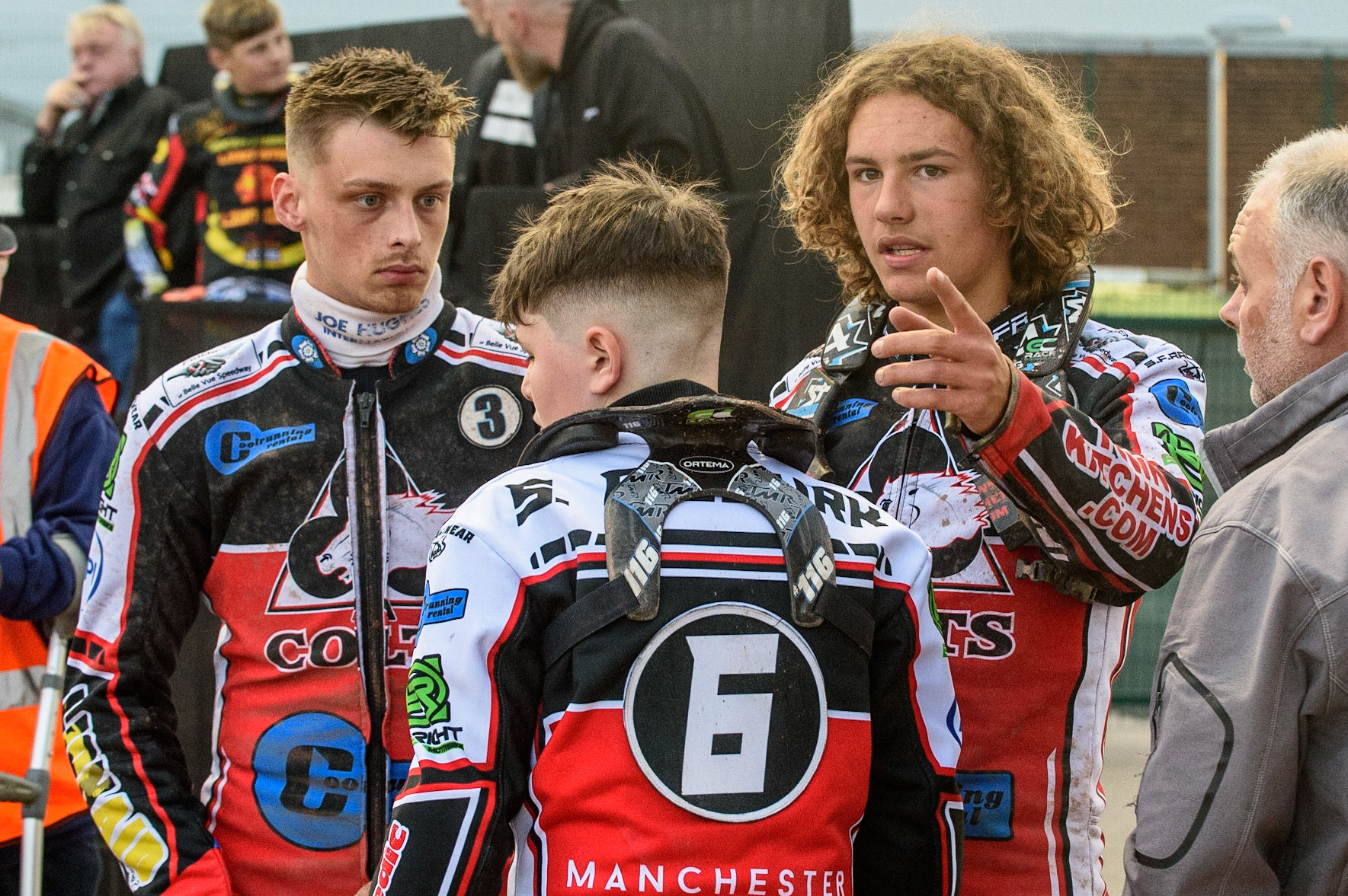 MANCHESTER, UK. JULY 29TH  Harry McGurk  (right) explains what happened in his fall to Jack Parkinson-Blackburn  (left) and Sam McGurk  (centre)  during the National Development League match between Belle Vue Colts and Leicester Lion Cubs at the National Speedway Stadium, Manchester on Thursday 29th July 2021. (Credit: Ian Charles | MI News)